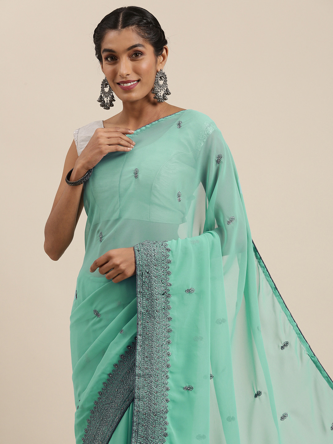 

Shaily Blue Ethnic Motifs Embroidered Pure Georgette Saree
