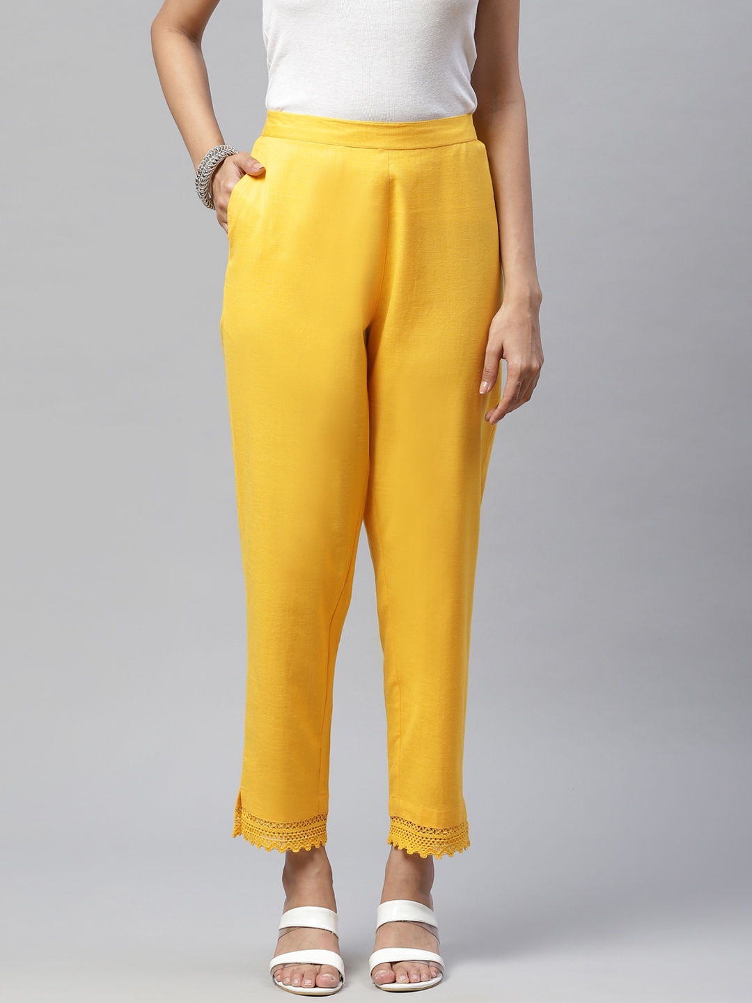 

PIROH Women Yellow Solid Cotton Trousers