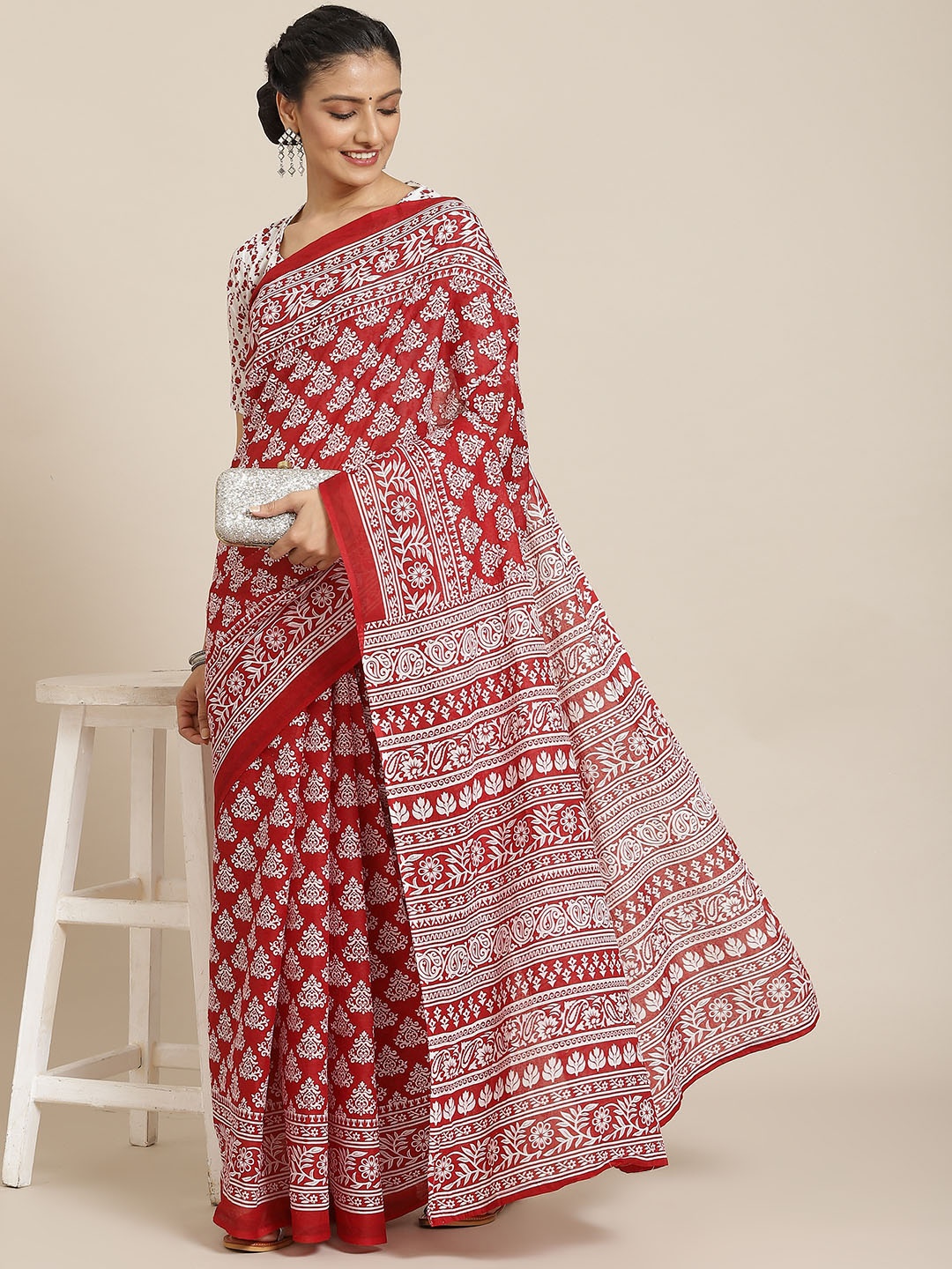 

Satrani Red & White Ethnic Motifs Ikat Saree