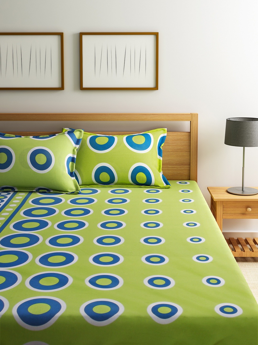 

Home Ecstasy Green Printed 140 TC Cotton Double Bedsheet with 2 Pillow Covers
