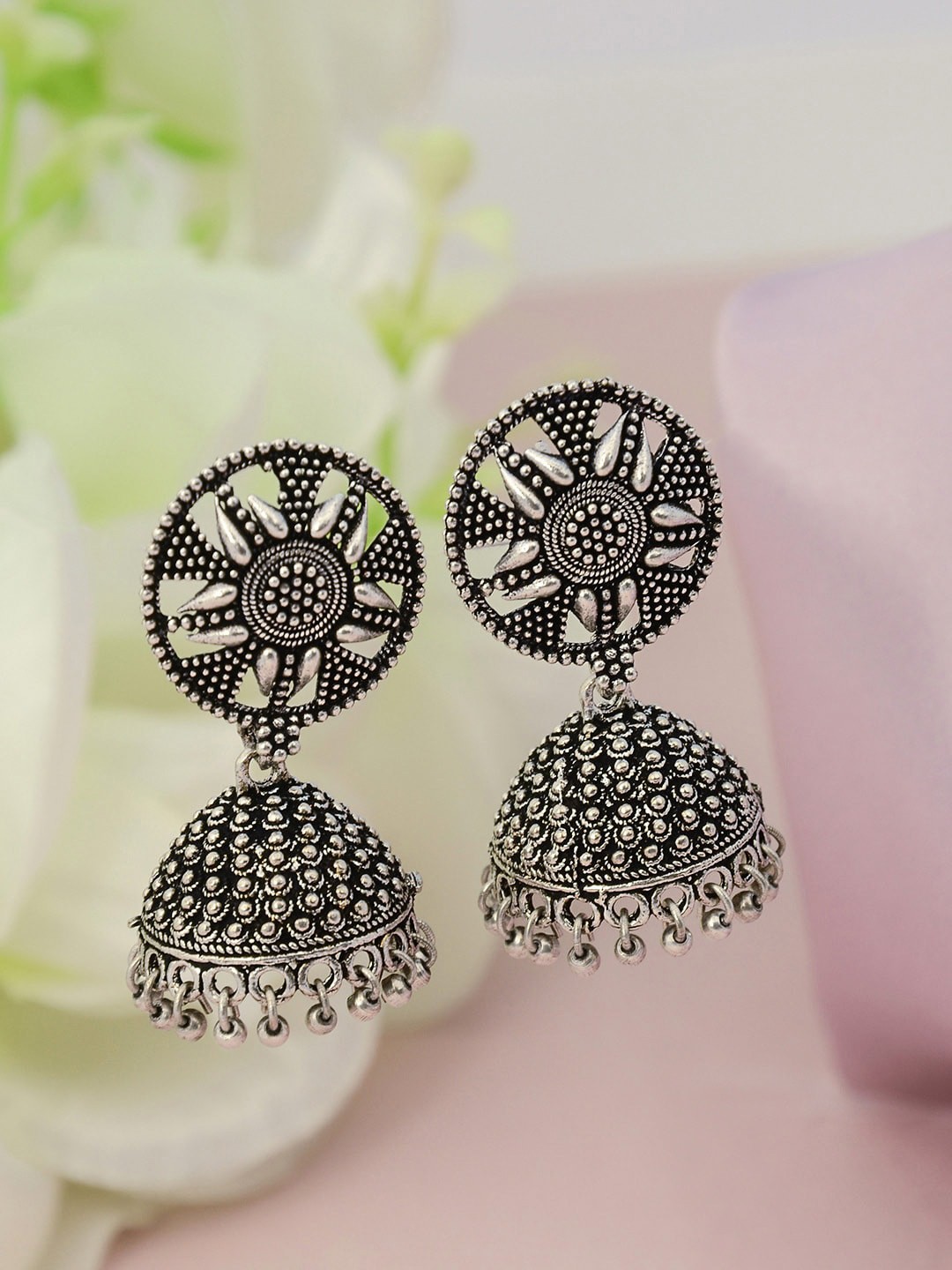 

Urmika Silver-Toned Classic Jhumkas Earrings