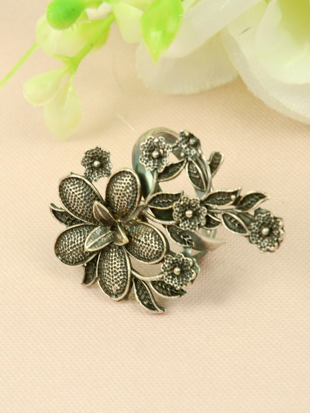 

Urmika Oxidized Floral Silver-Plated Finger Adjustable Ring