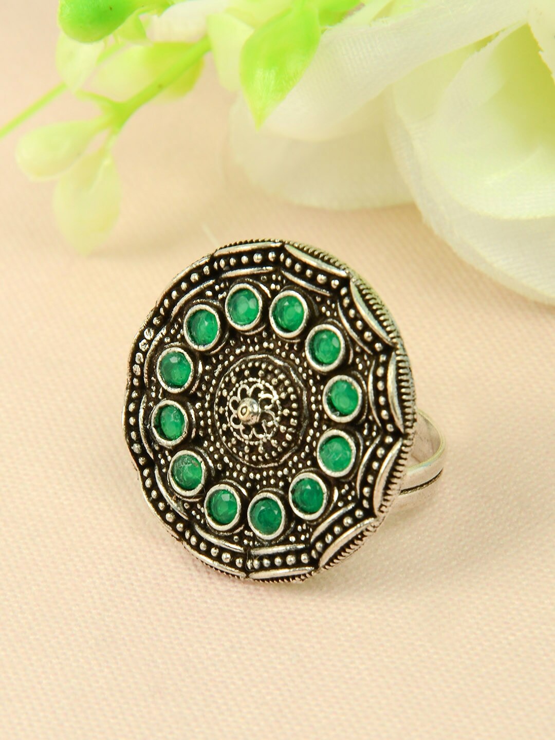 

Urmika Oxidized Silver-Toned Green Crystal Circular Traditional Ring