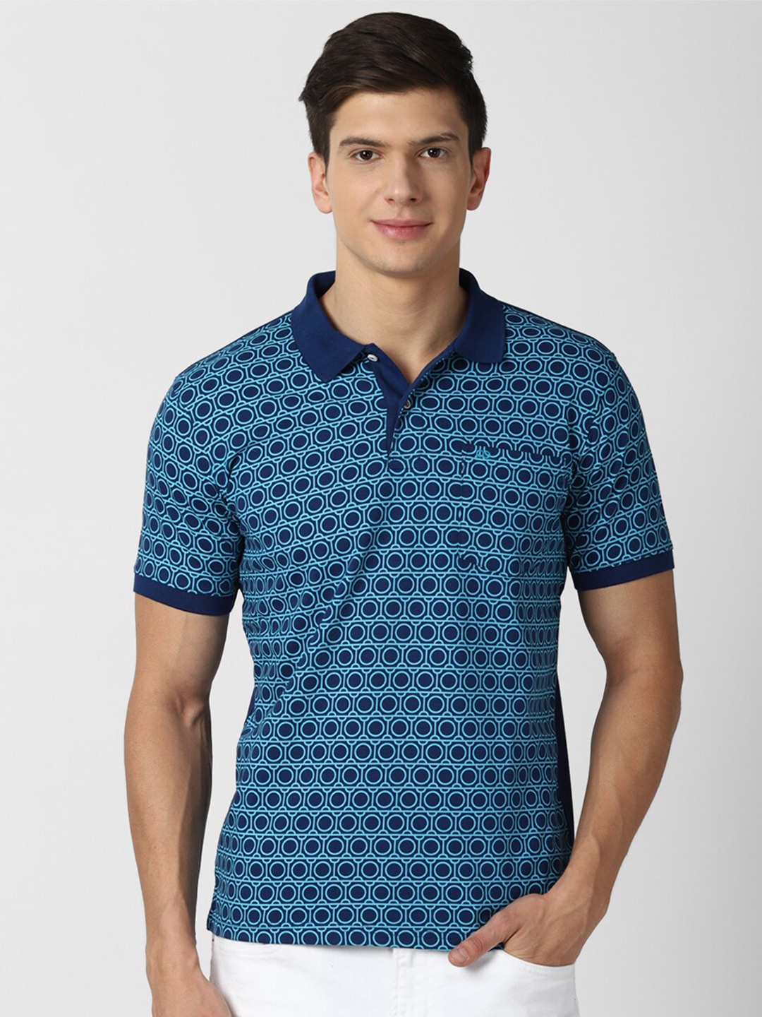 

Peter England Casuals Men Blue Printed Polo Collar T-shirt