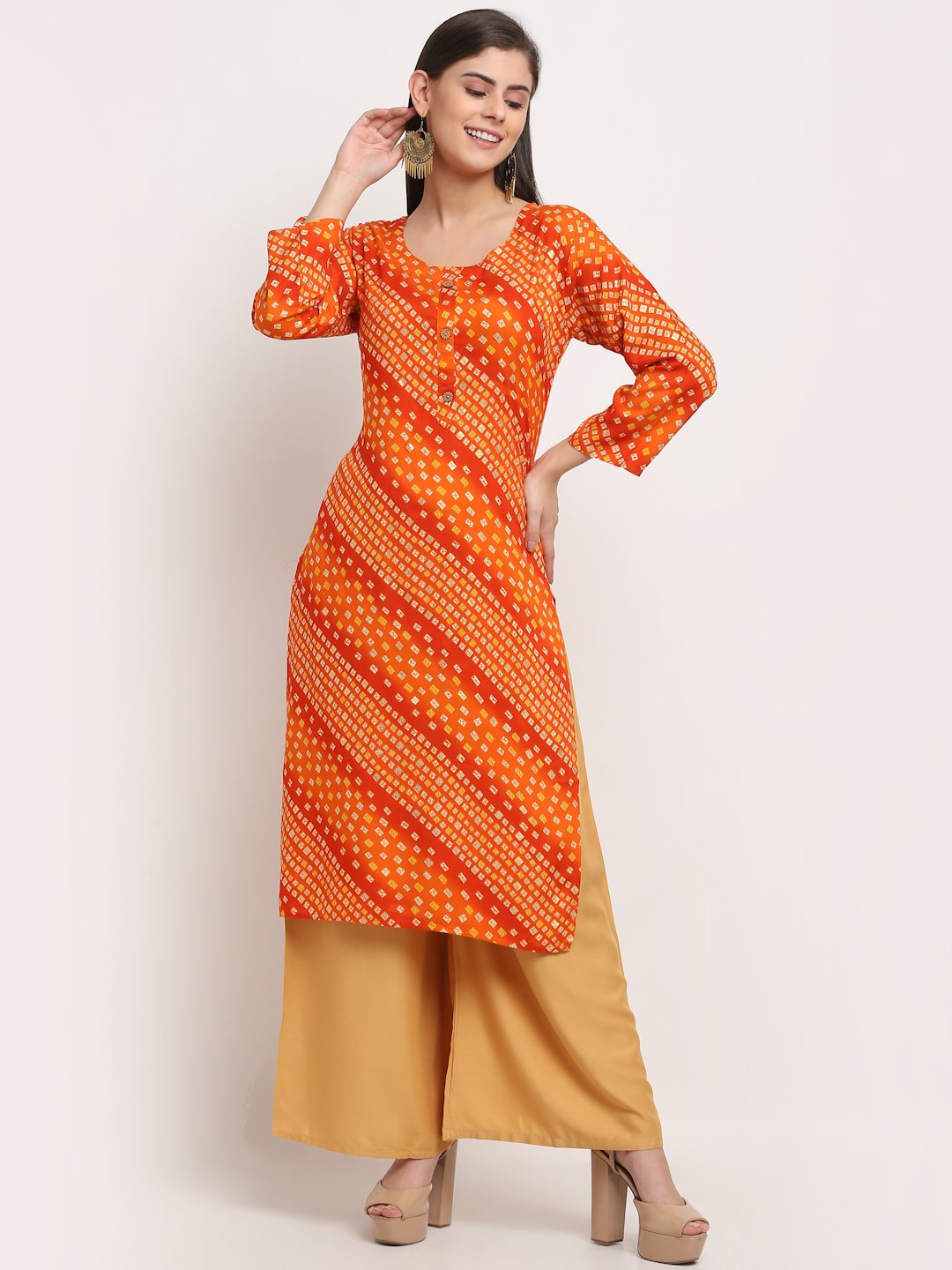 

GRACIT Women Orange Printed Kurta with Palazzos