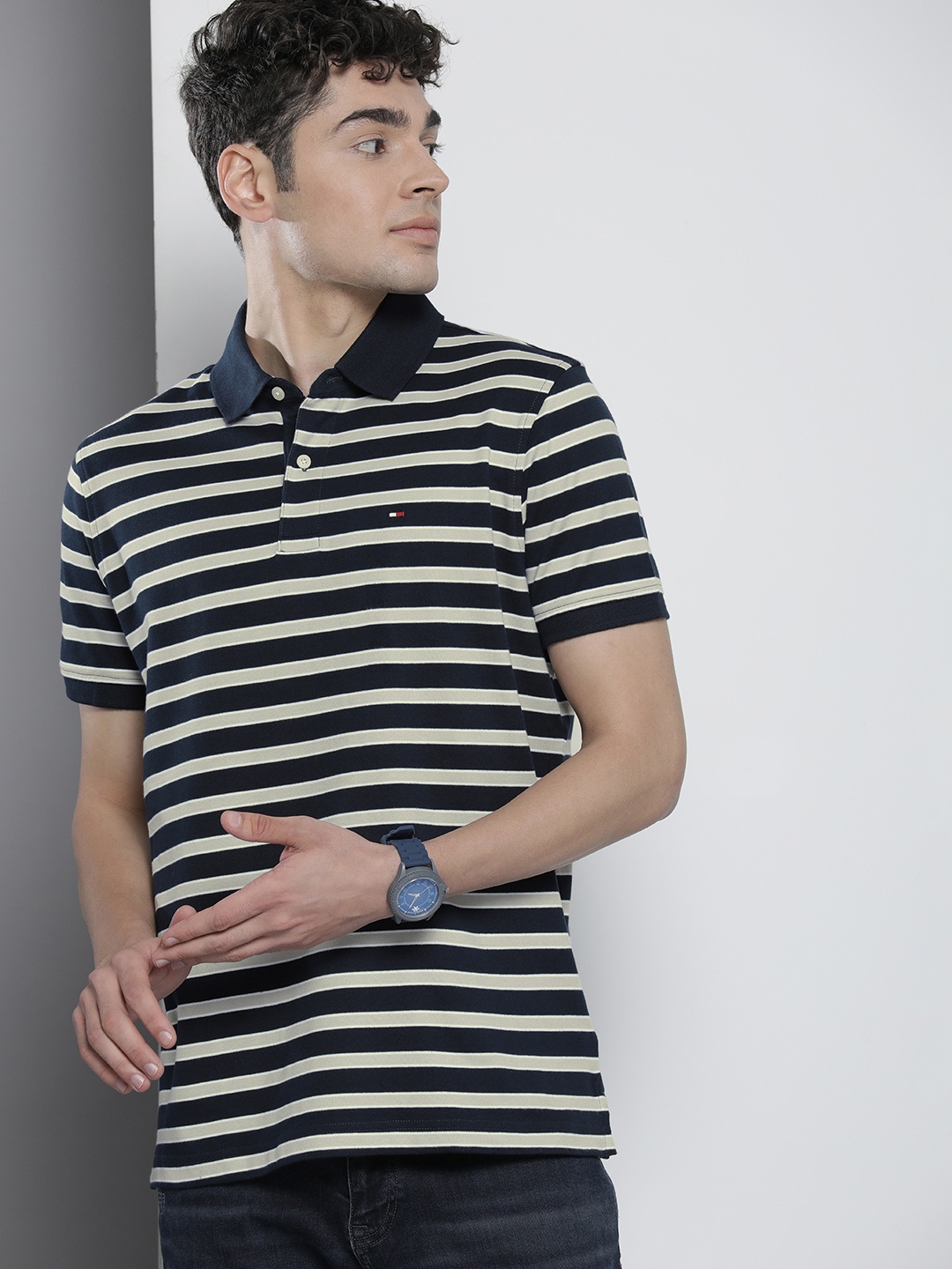 

Tommy Hilfiger Men Navy Blue & Grey Striped Pure Cotton Polo Collar T-shirt