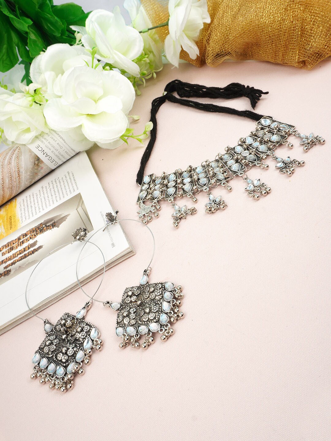 

Urmika Silver-Toned White Stone-Studded Beaded Crystal Jewellery Set