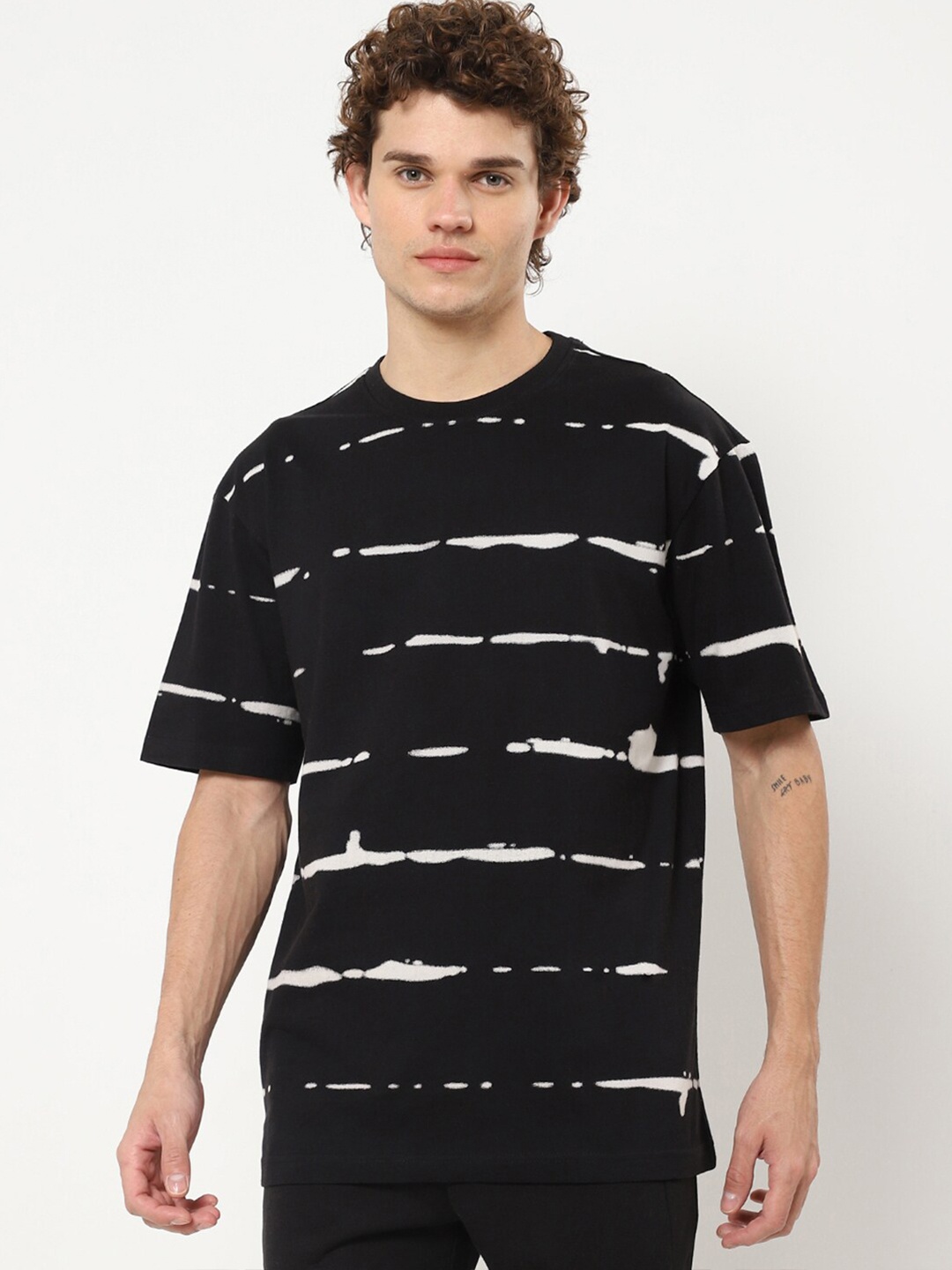 

Bewakoof Men Black Striped Oversized T-shirt