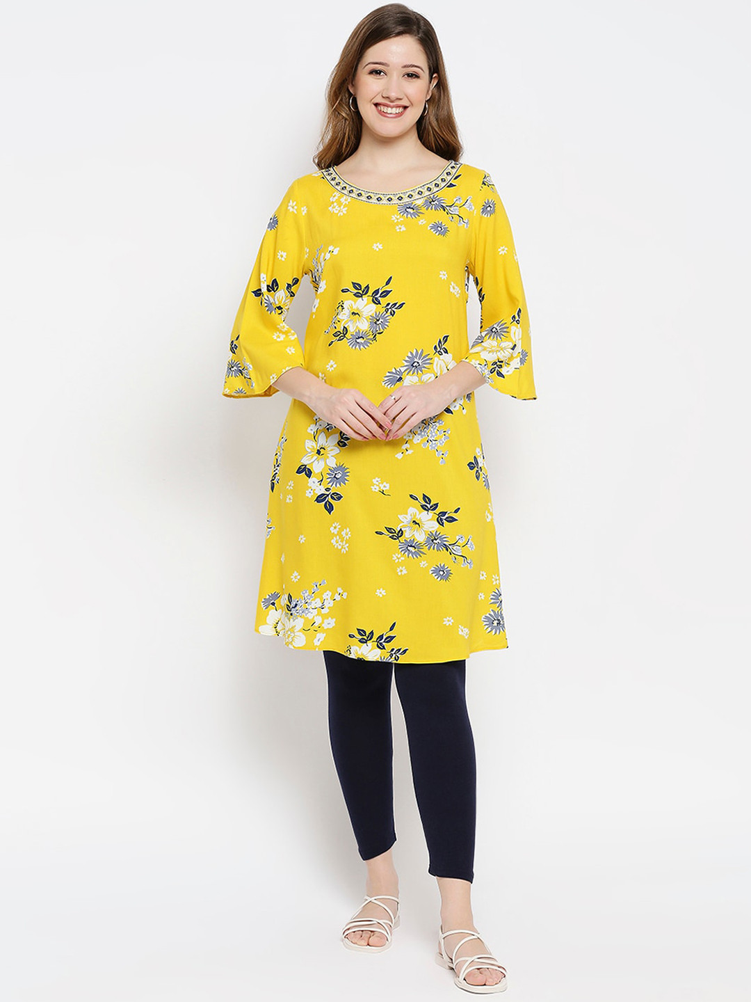 

Ethnicity Women Yellow floralPrinted Flared Sleeves Thread Work Kurta