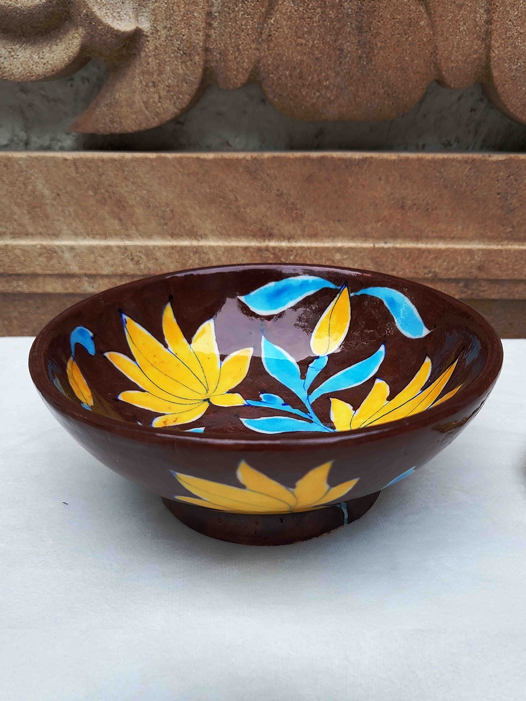 

Folkstorys Brown & Yellow Printed Handmade Dharini Blue pottery Serving Bowl