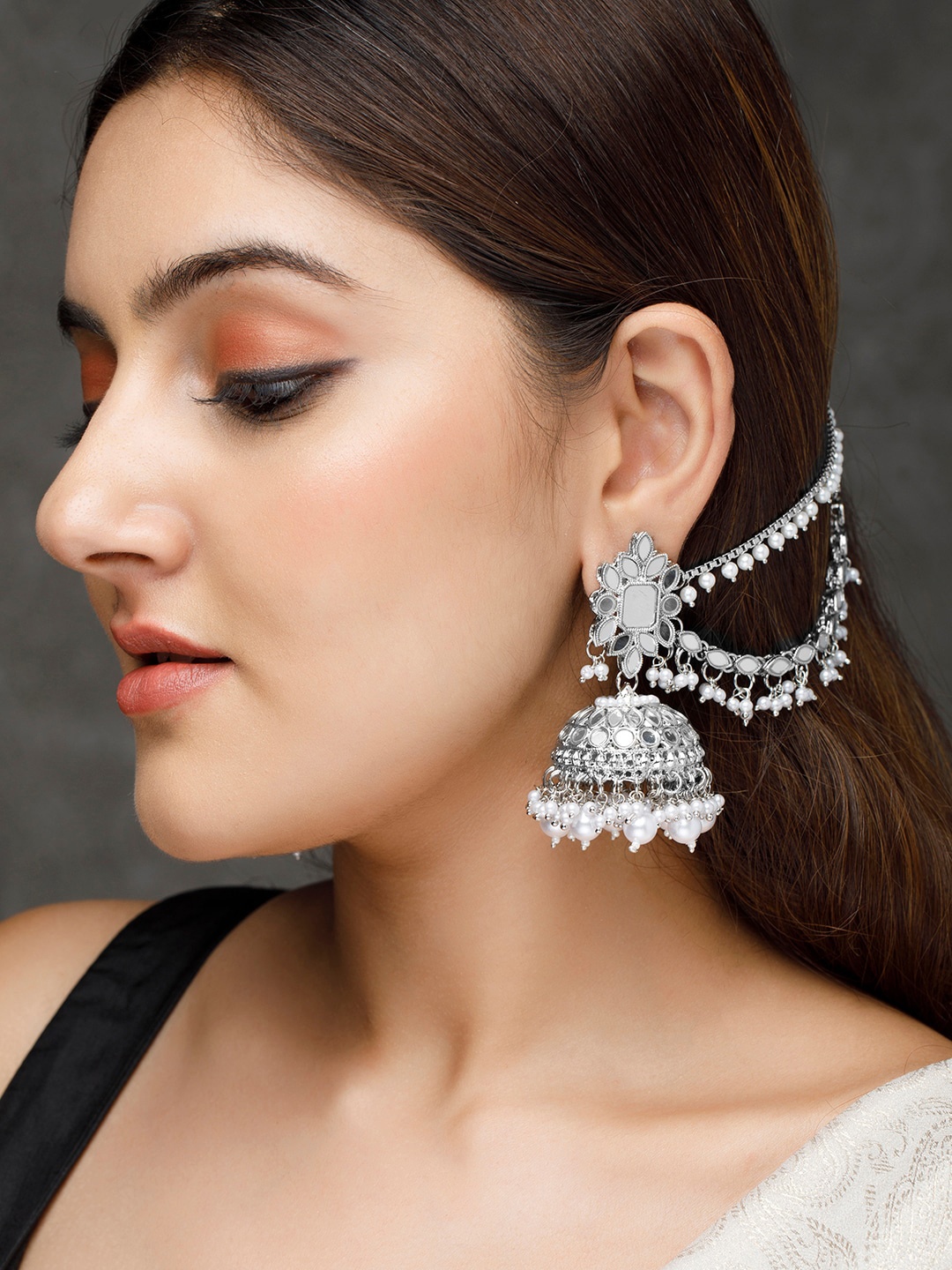 

Rubans Silver-Toned Dome Shaped Jhumkas Earrings