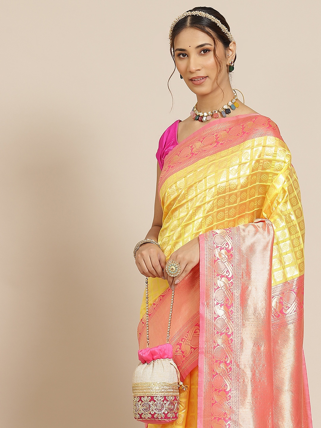 

Warthy Ent Yellow & Pink Ethnic Motifs Zari Silk Blend Kanjeevaram Saree