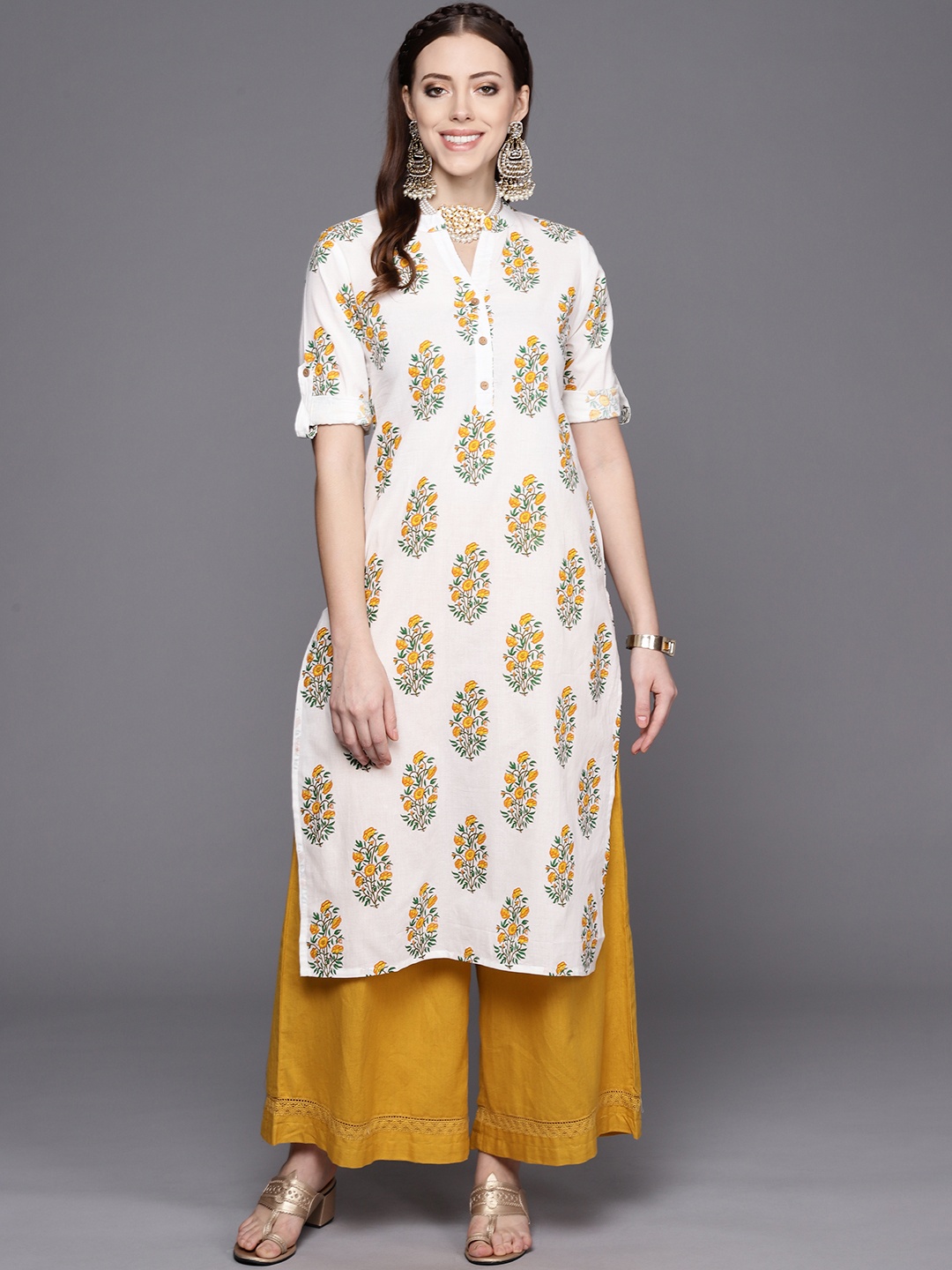 

Varanga Women White & Yellow Ethnic Motifs Printed Kurta