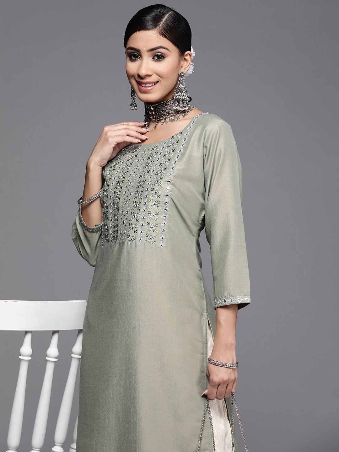 

Libas Women Green Yoke Design Mirror Work Pastel Kurta