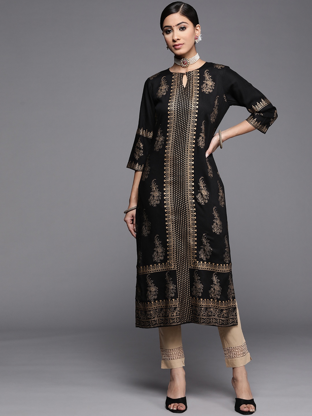 

Libas Women Black & Golden Paisley Printed Keyhole Neck Kurta