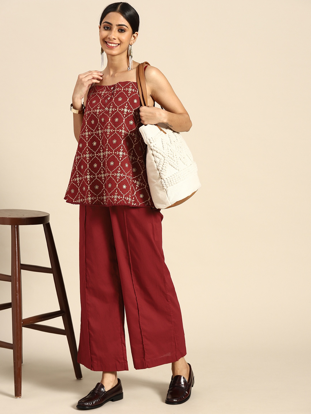 

Sangria Women Maroon & Golden Ethnic Motifs Printed Pure Cotton Kurti with Palazzos