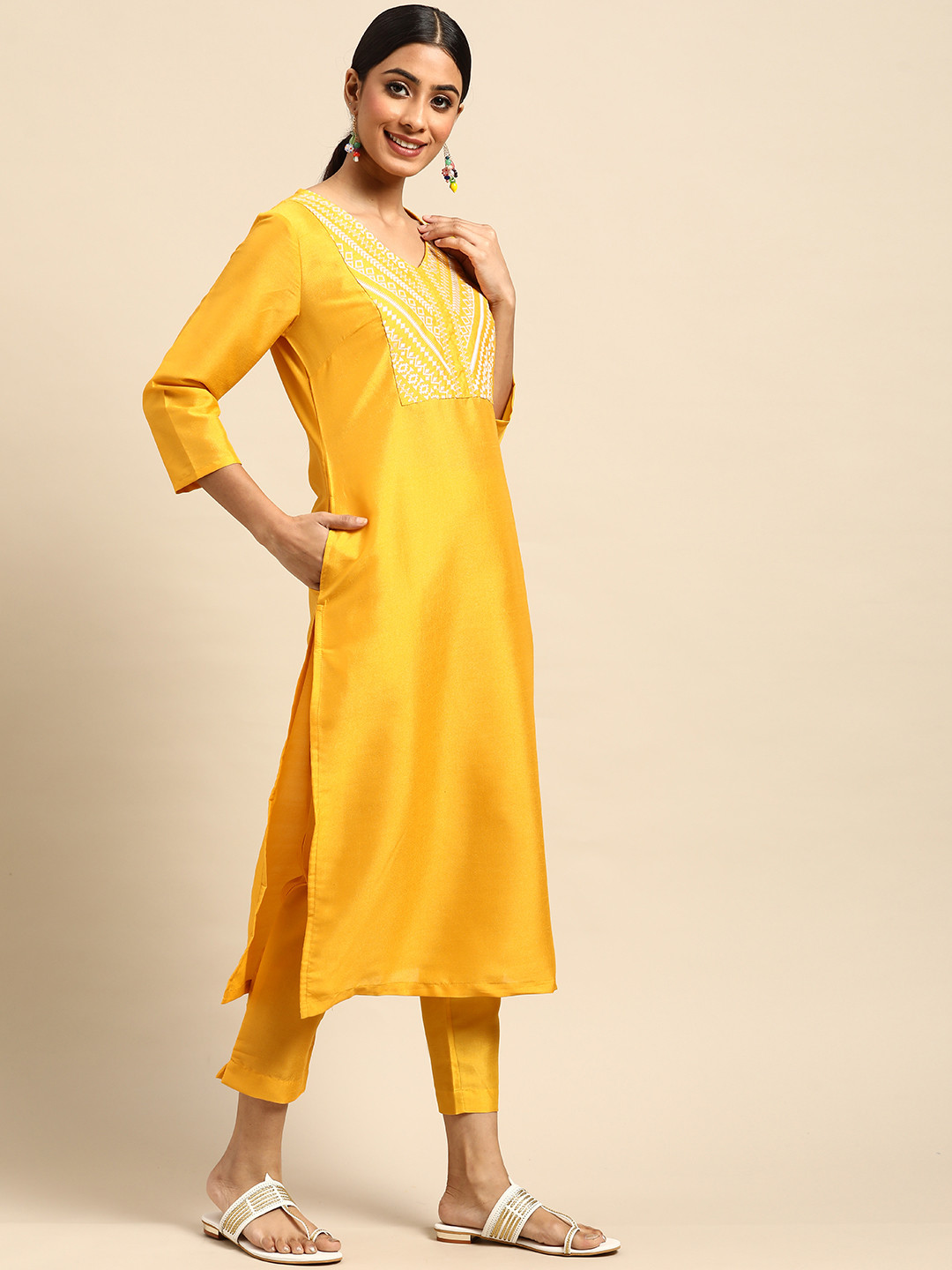 

Sangria Women Mustard Yellow Ethnic Motifs Yoke Design Kurta with Trousers