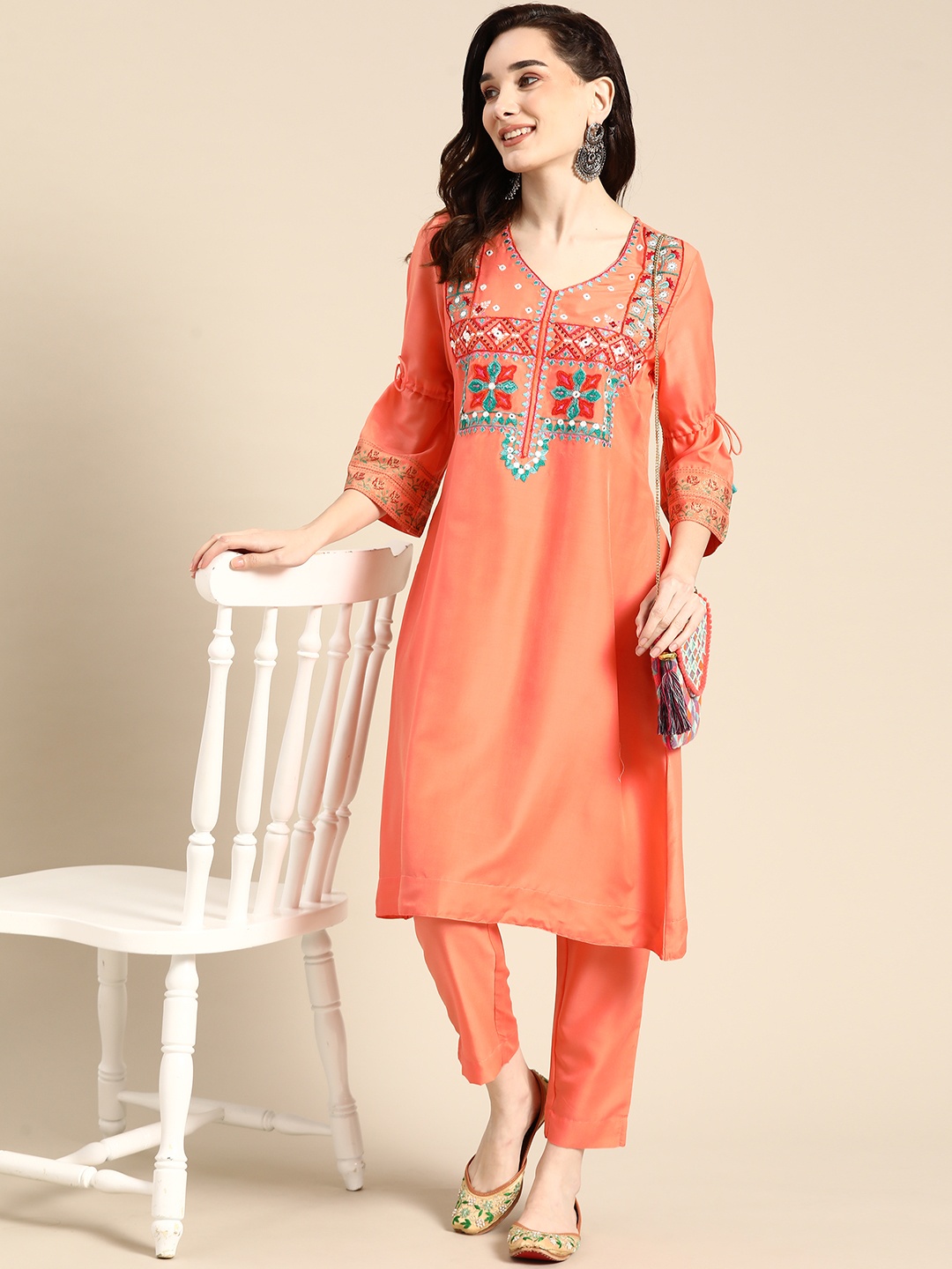 

Sangria Women Peach-Coloured Ethnic Yoke Design Pleated Thread Work Kurta with Trousers