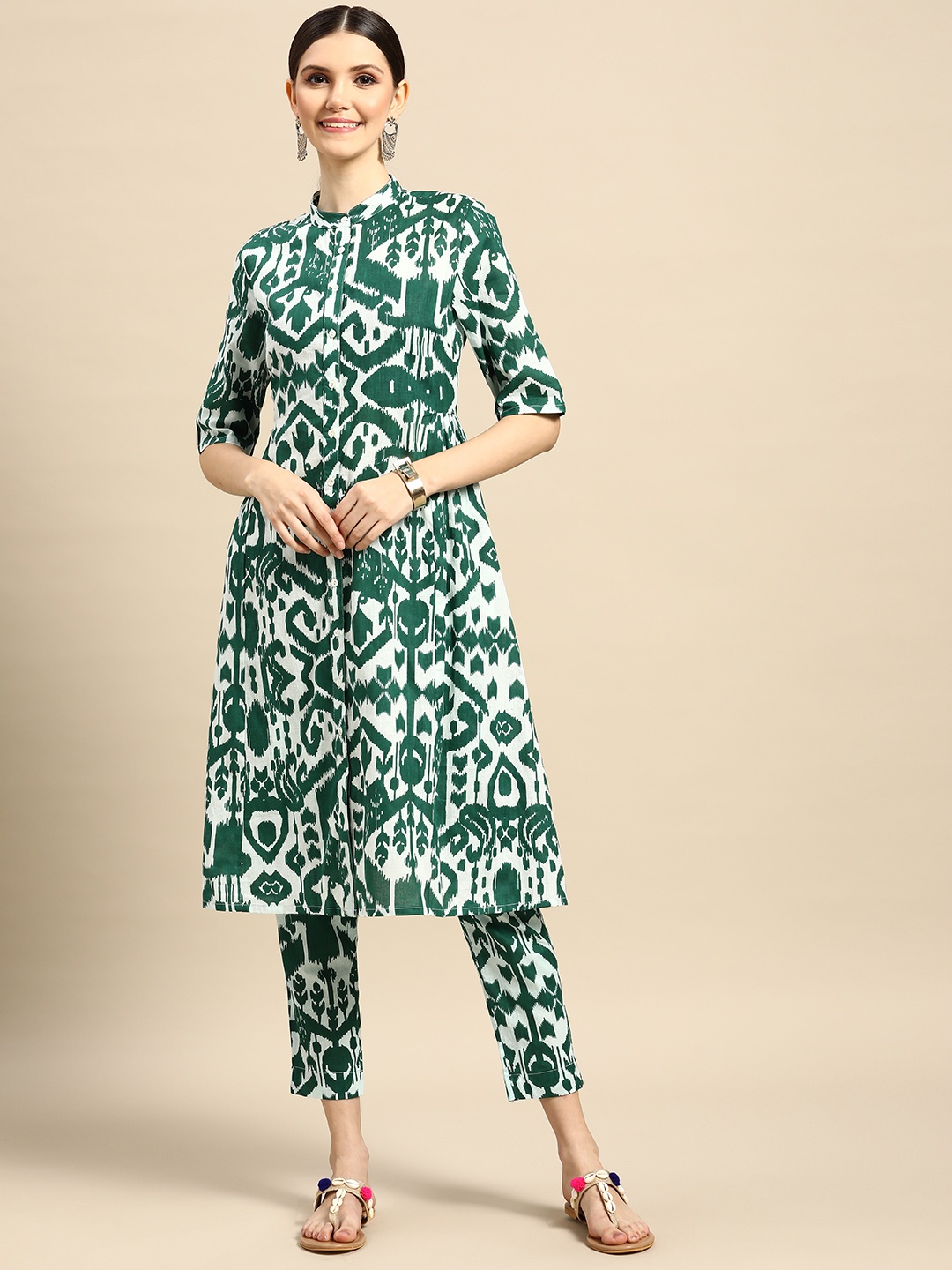 

Sangria Women Green Ikat Inspired Ethnic Motifs Printed Pure Cotton Kurta with Trousers