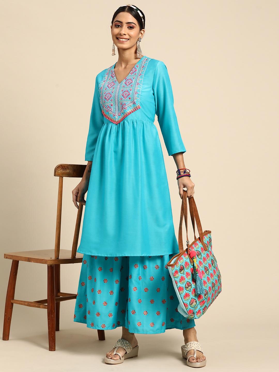 

Sangria Women Turquoise Blue Ethnic Motifs Embroidered Kurta with Sharara