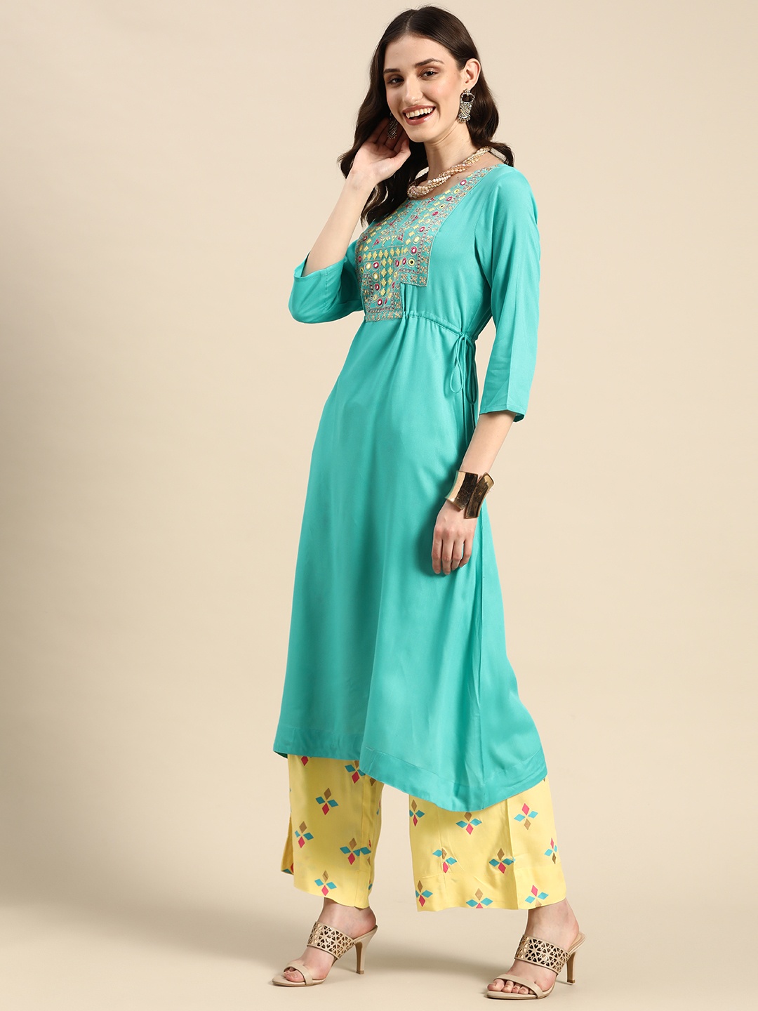 

Sangria Women Blue & Yellow Ethnic Motifs Embroidered Yoke Design Kurta with Palazzos