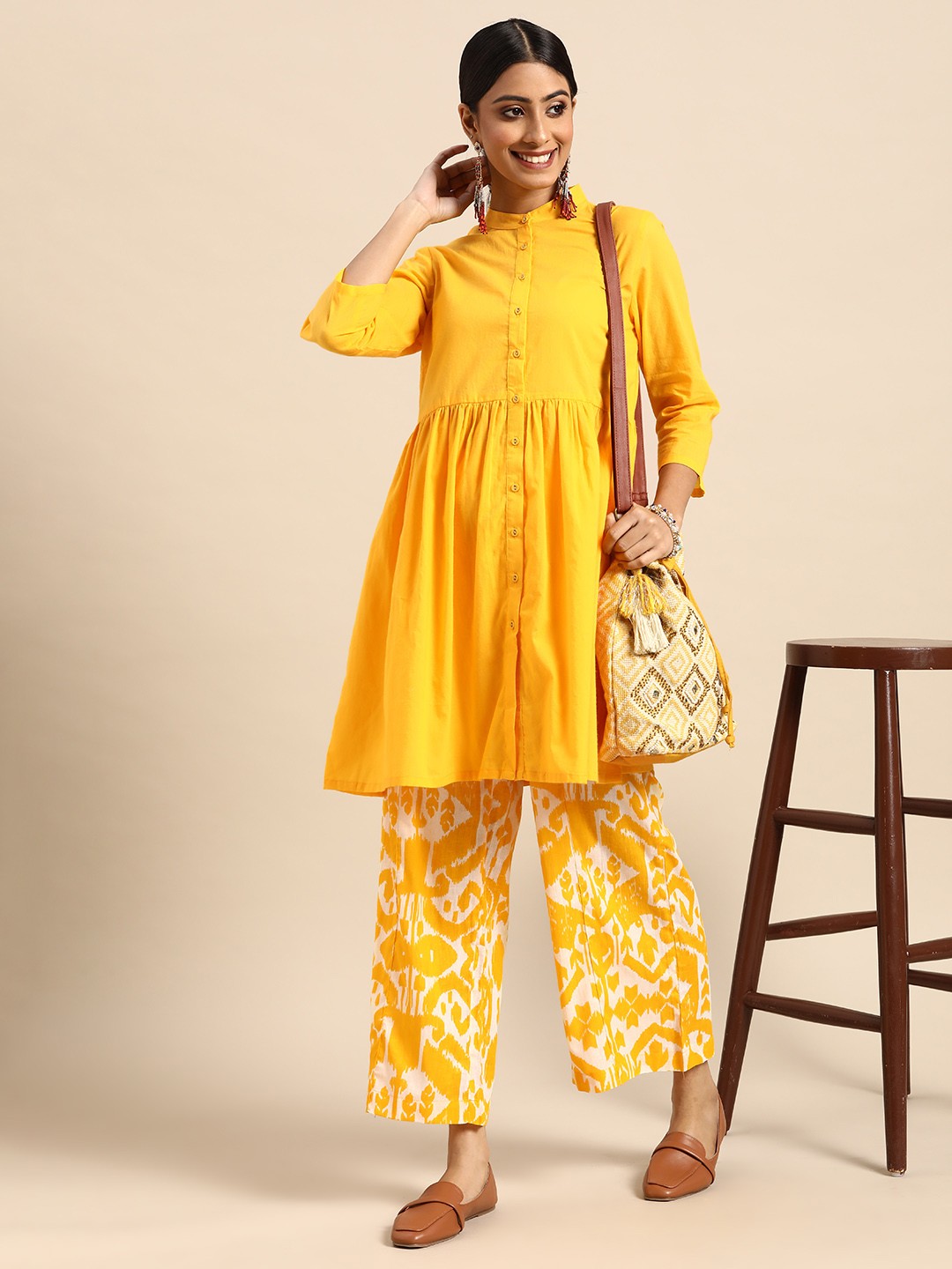 

Sangria Women Yellow Empire Pure Cotton Kurta with Palazzos