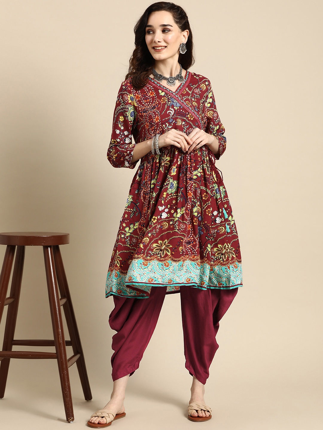 

Sangria Women Maroon Ethnic Motifs Printed Angrakha Mirror Work Kurta with Dhoti Pants