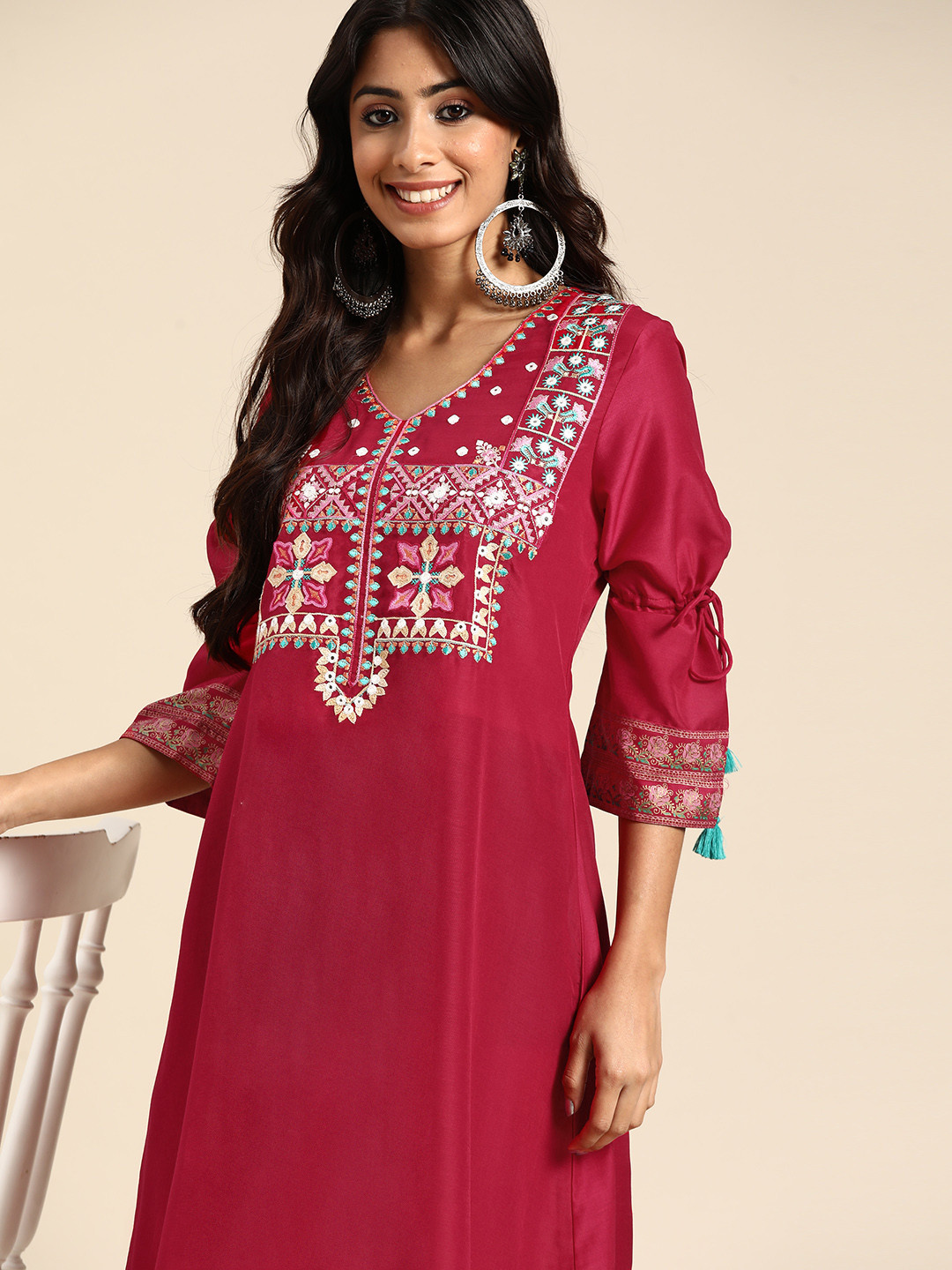 

Sangria Women Magenta Ethnic Yoke Design Pleated Thread Work Kurta with Trousers