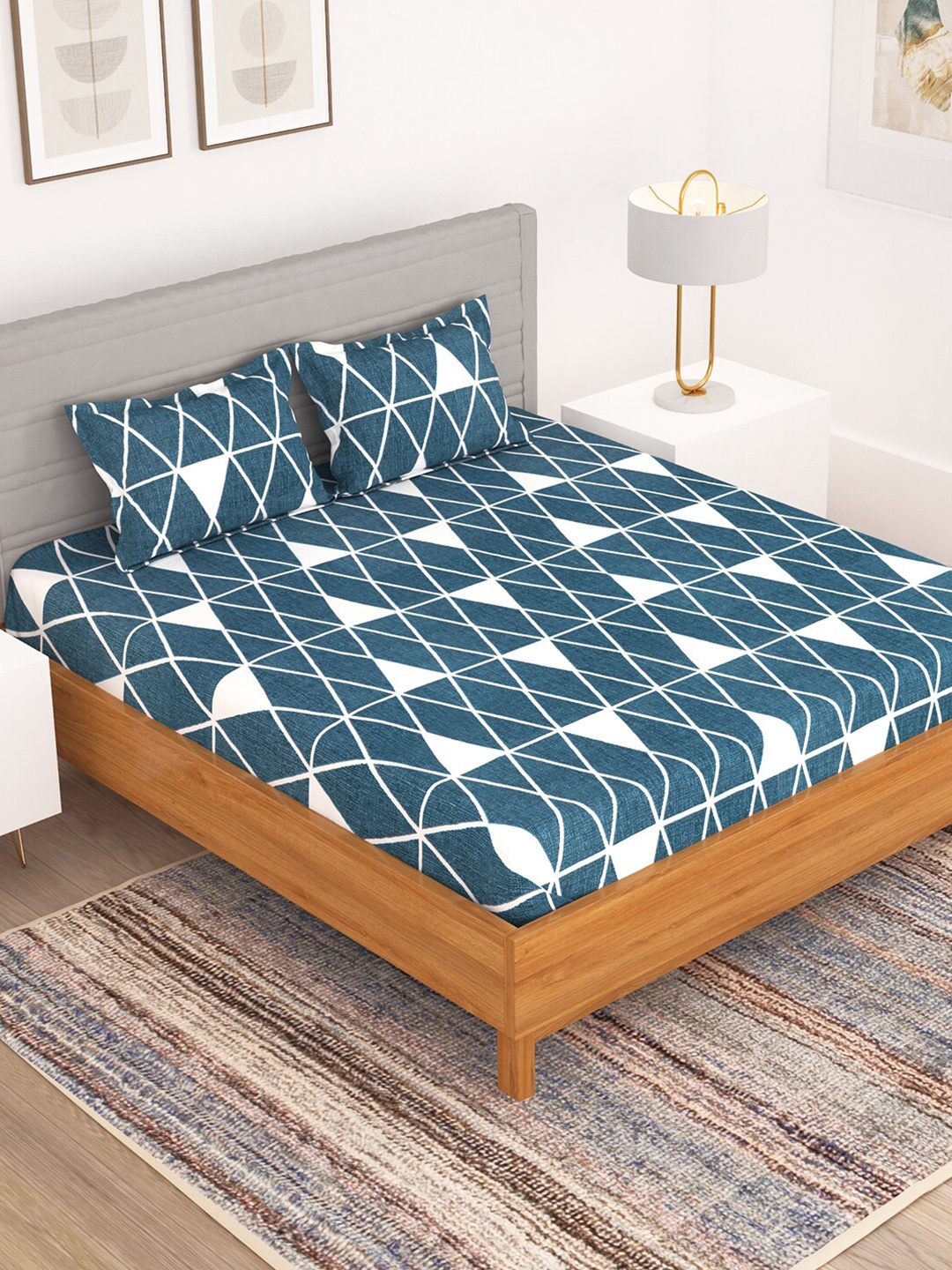 

Bedspun Blue & White Geometric 150 TC Queen Bedsheet with 2 Pillow Covers