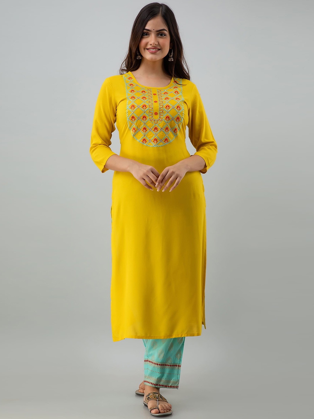

KIMAYRA Women Mustard Yellow Embroidered Pleated Kurti with Trousers & With Dupatta
