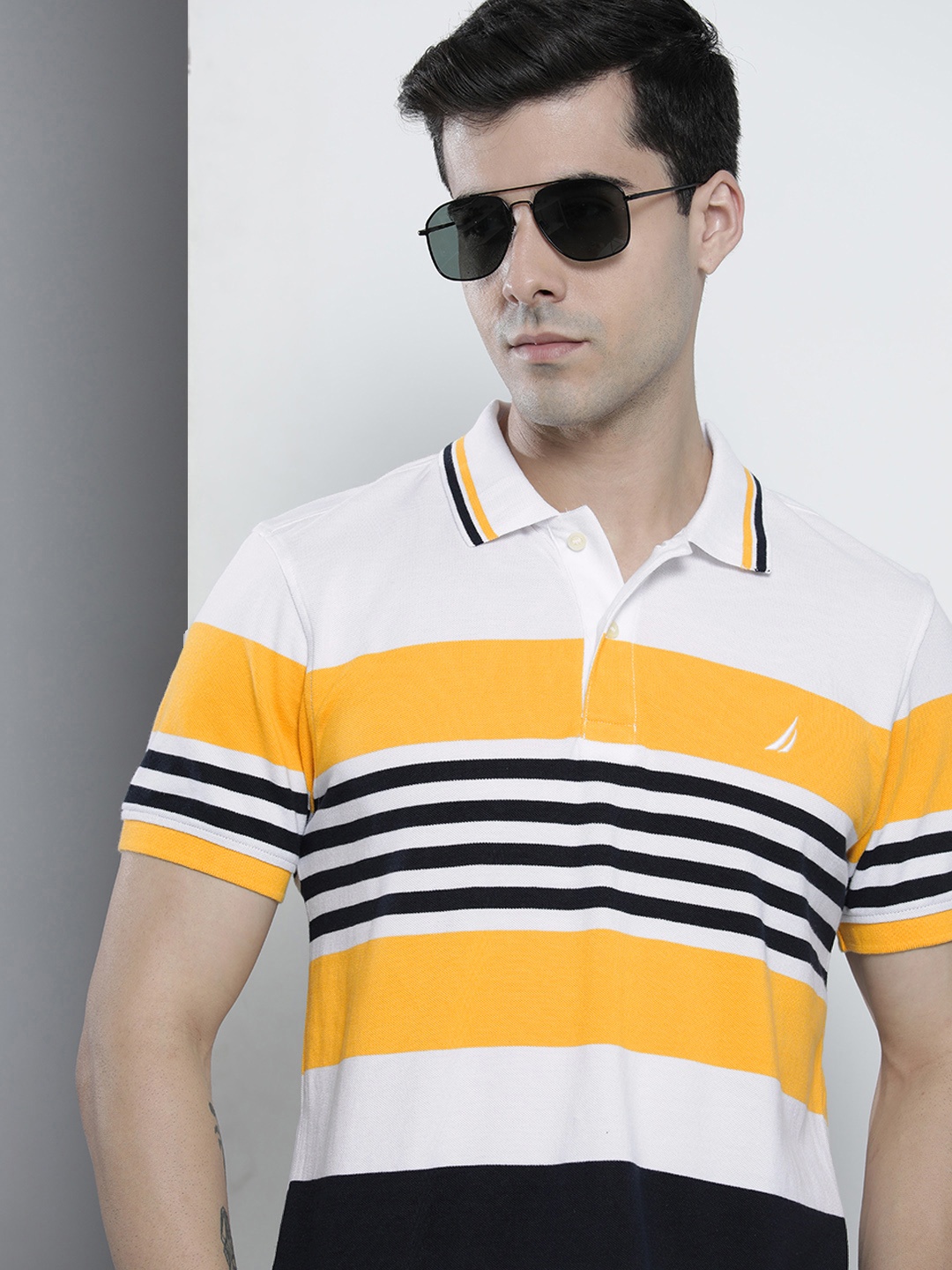 

Nautica Men White & Yellow Striped Pure Cotton Polo Collar T-shirt