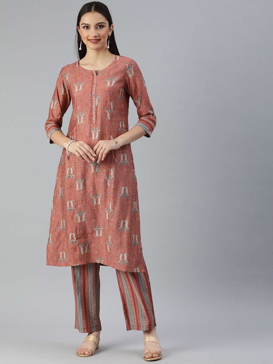 

ETIQUETTE Women Peach-Coloured Floral Printed Kurta with Palazzos