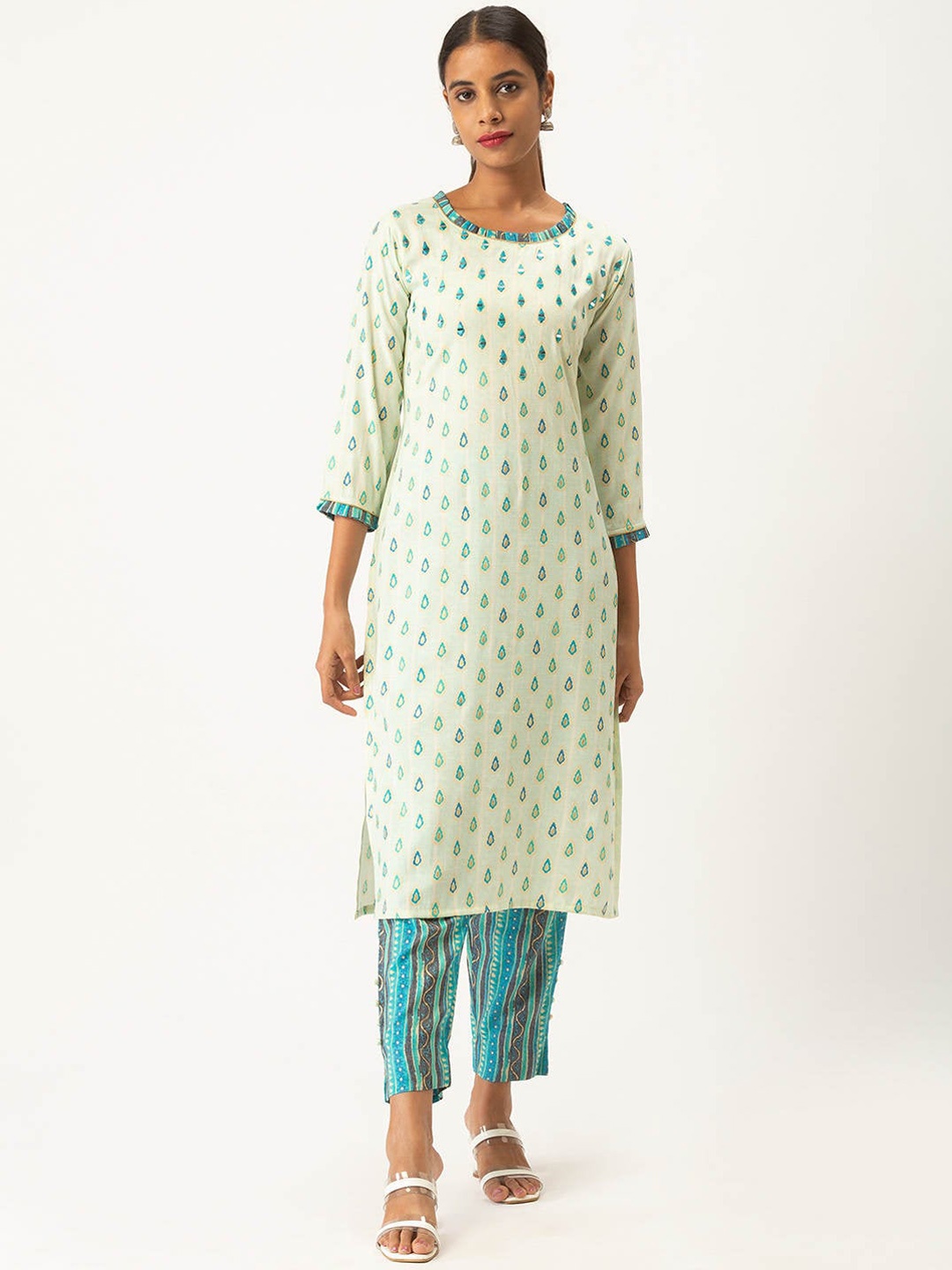 

ZOLA Women Blue Floral Panelled Kurti with Trousers