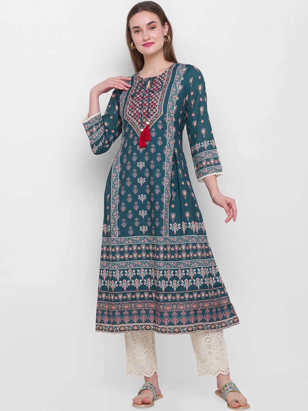 

ZOLA Women Green Ethnic Motifs Panelled Kurti with Trousers