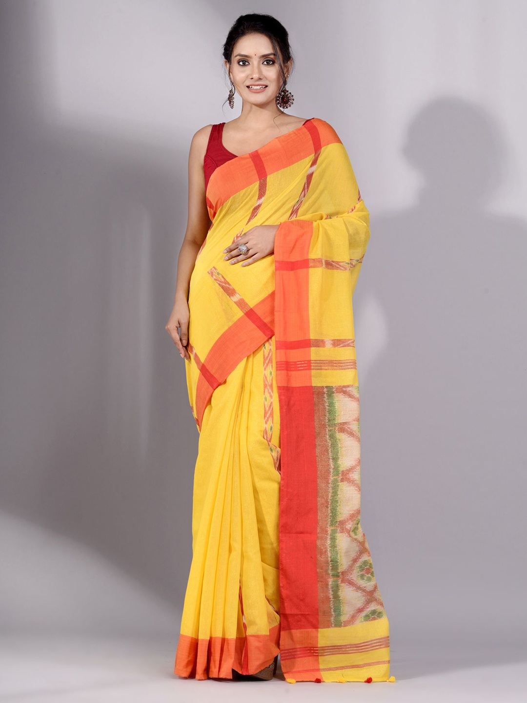 

Charukriti Yellow & Red Woven Design Tissue Saree
