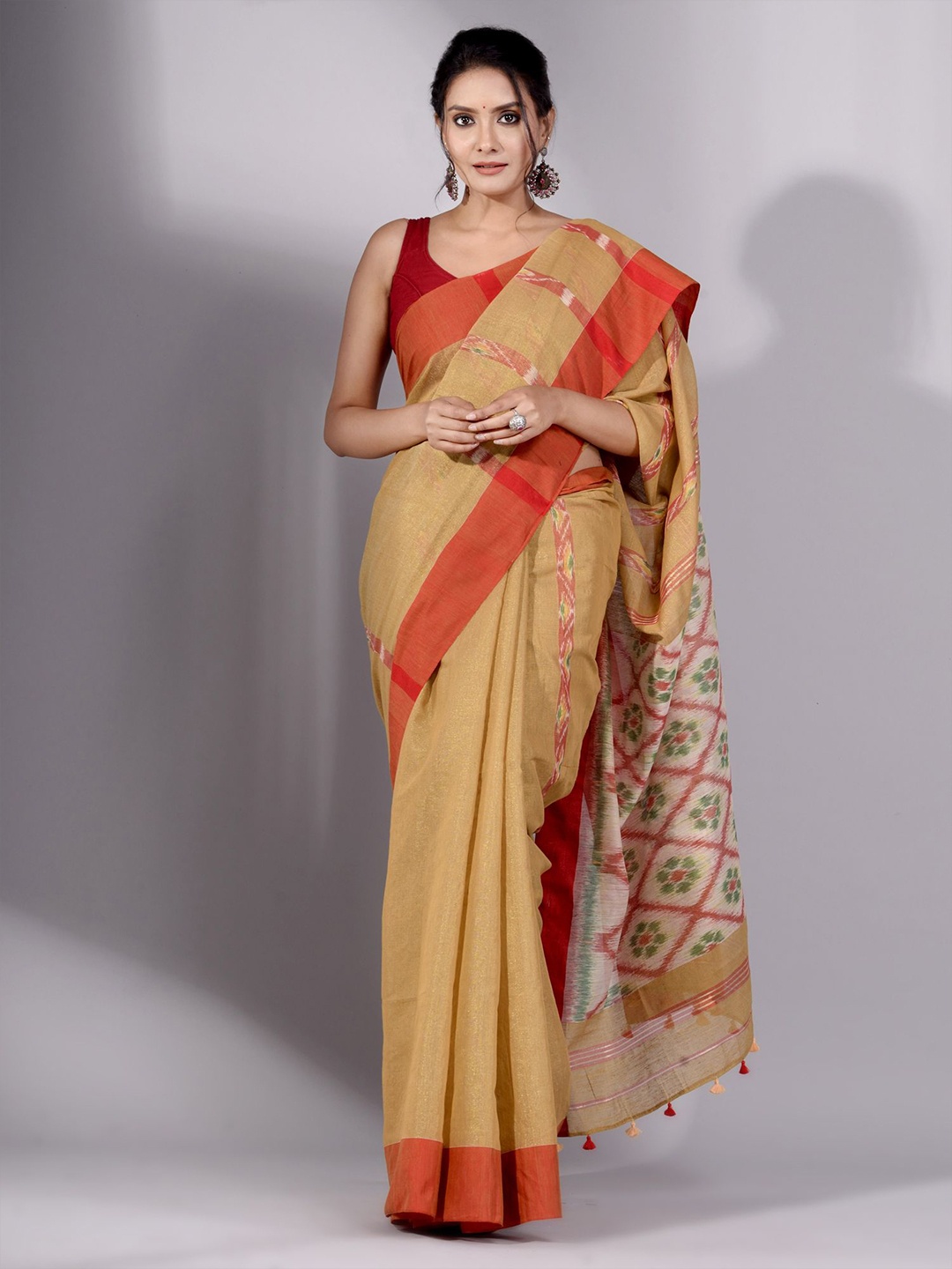 

Charukriti Beige & Green Woven Design Tissue Saree