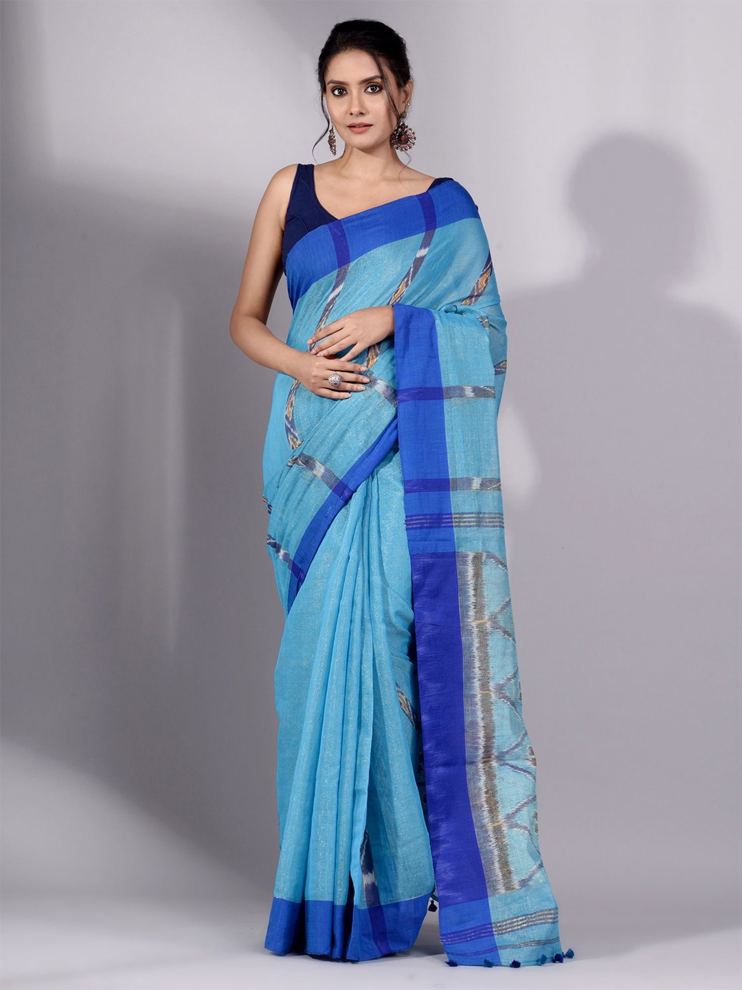 

Charukriti Women Blue Sarees