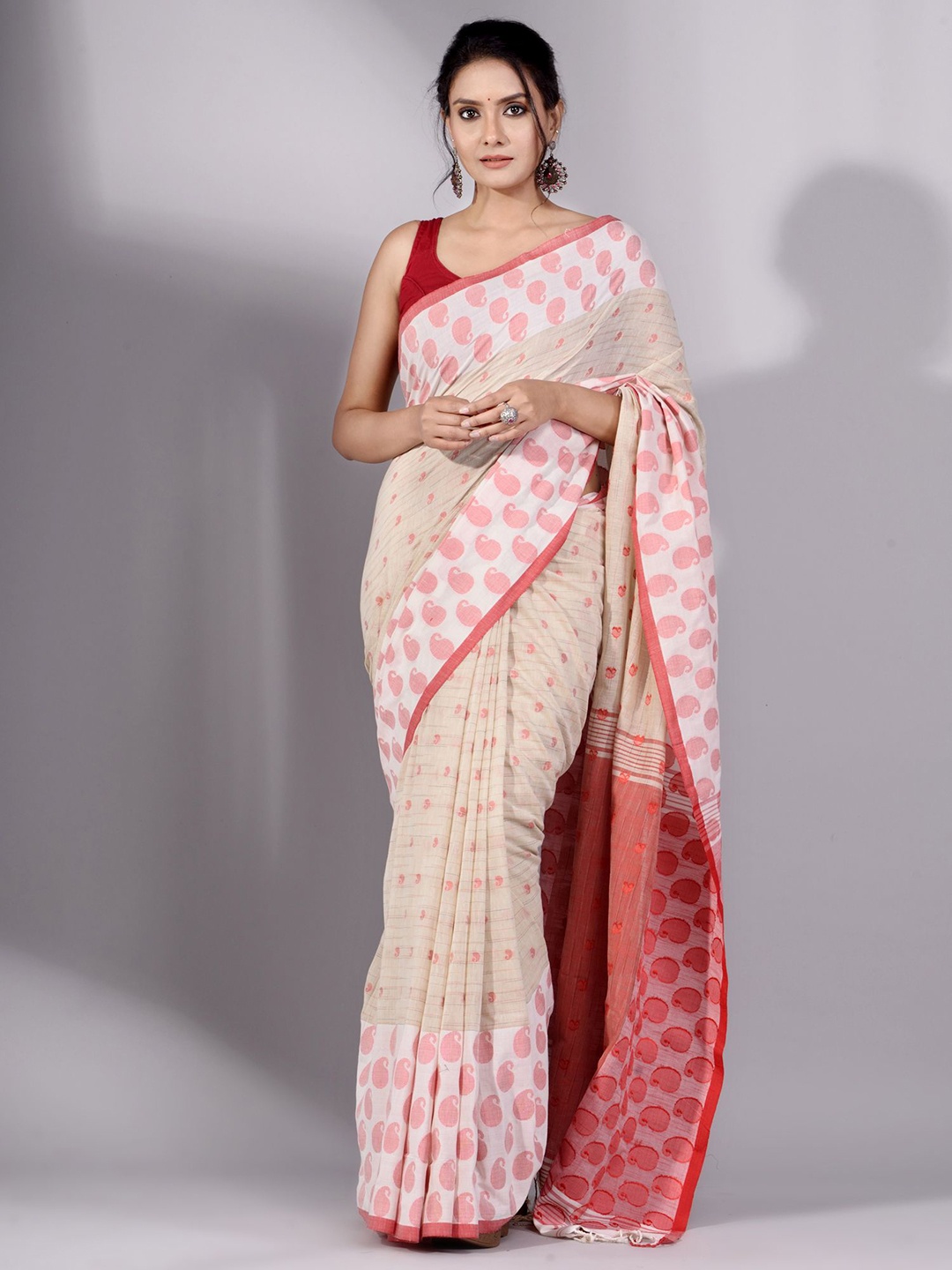 

Charukriti Women Cream Sarees
