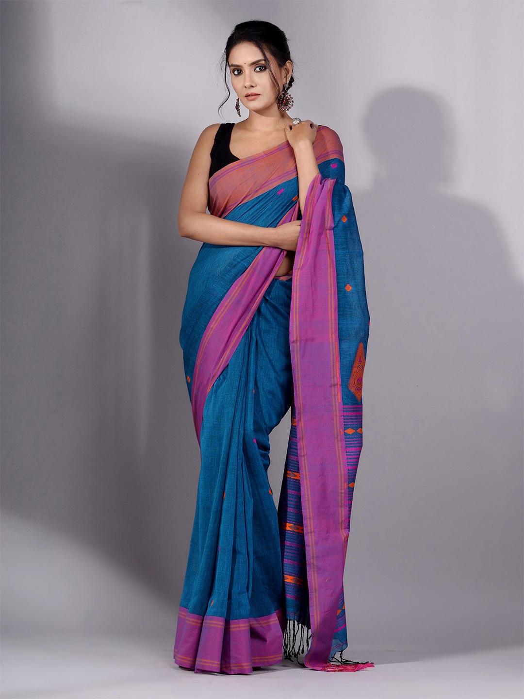 

Charukriti Teal & Magenta Pure Cotton Saree