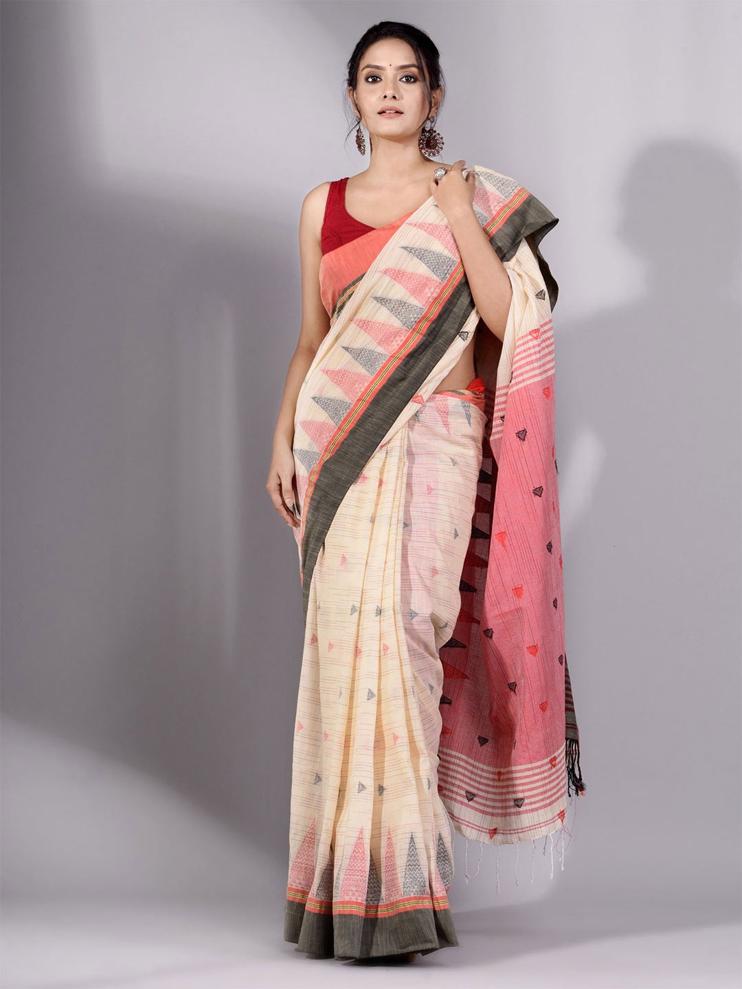 

Charukriti Women Beige Sarees