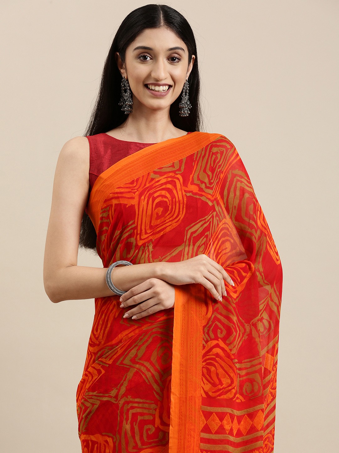 

Shaily Orange & Red Abstract Print Saree With Unstitched Blouse
