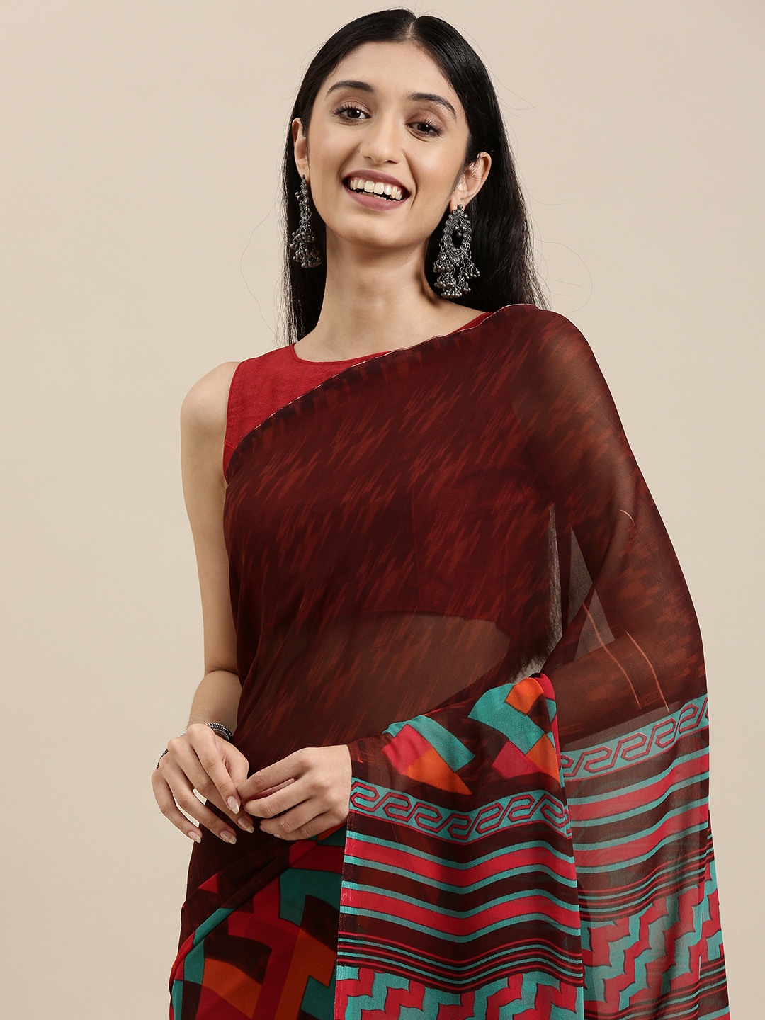 

Shaily Brown & Red Abstract Print Saree With Unstitched Blouse