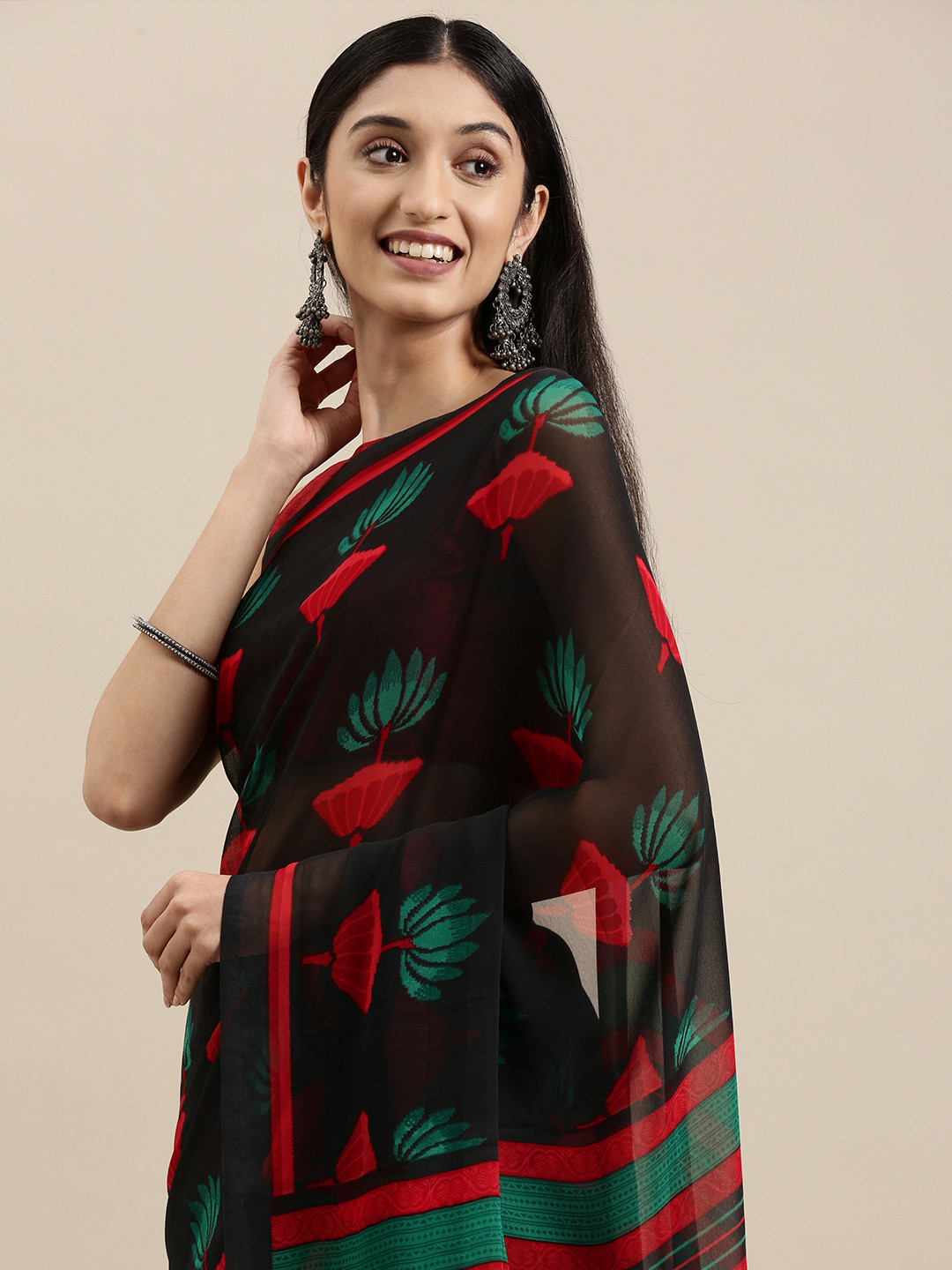 

Shaily Black & Green Ethnic Motifs Print Saree With Unstitched Blouse