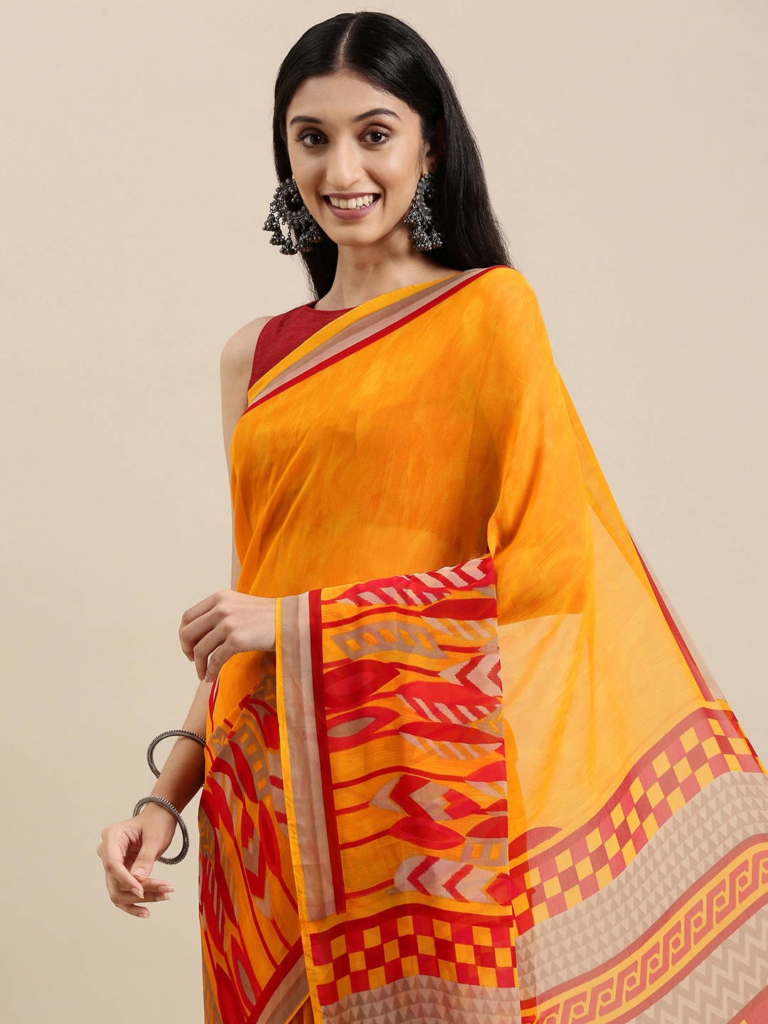 

Shaily Mustard Yellow & Red Ethnic Motifs Saree With Unstitched Blouse