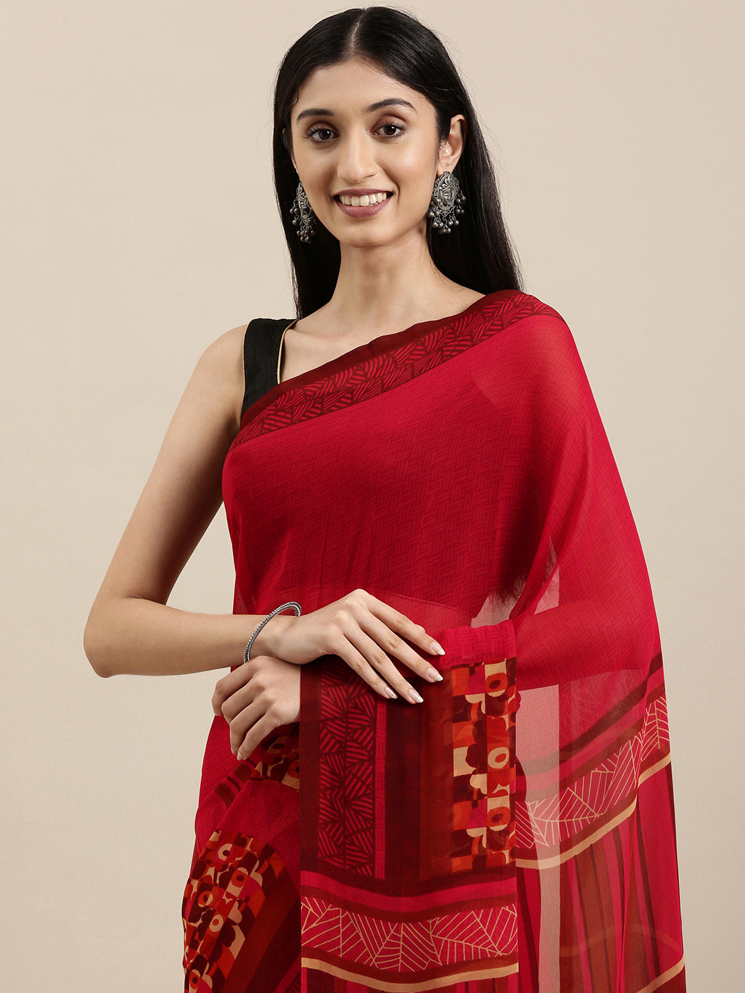 

Shaily Maroon Abstract Print Saree With Unstitched Blouse