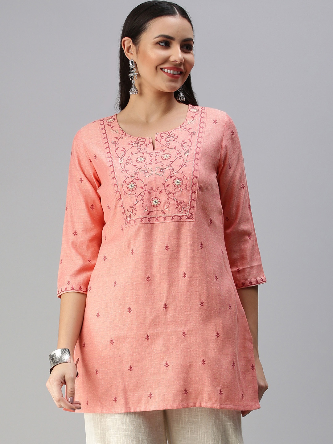 

ETIQUETTE Peach-Coloured Ethnic Motifs Embroidered Kurti