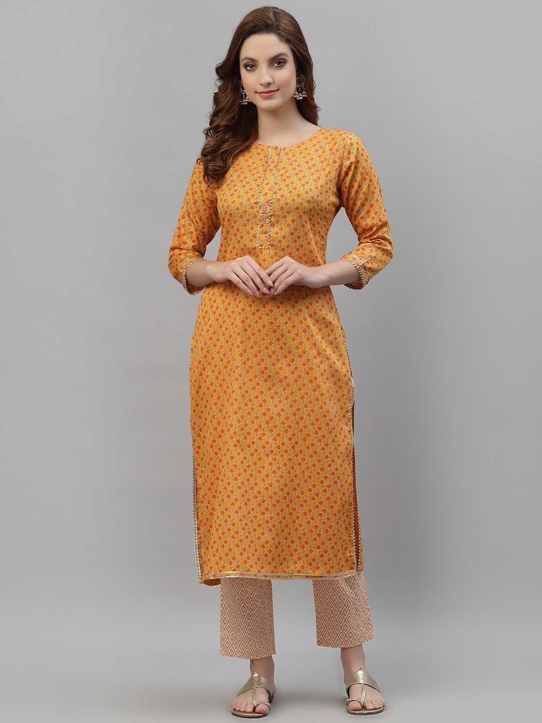 

TANKHI Women Yellow Floral Printed Chanderi Cotton Kurta with Trousers