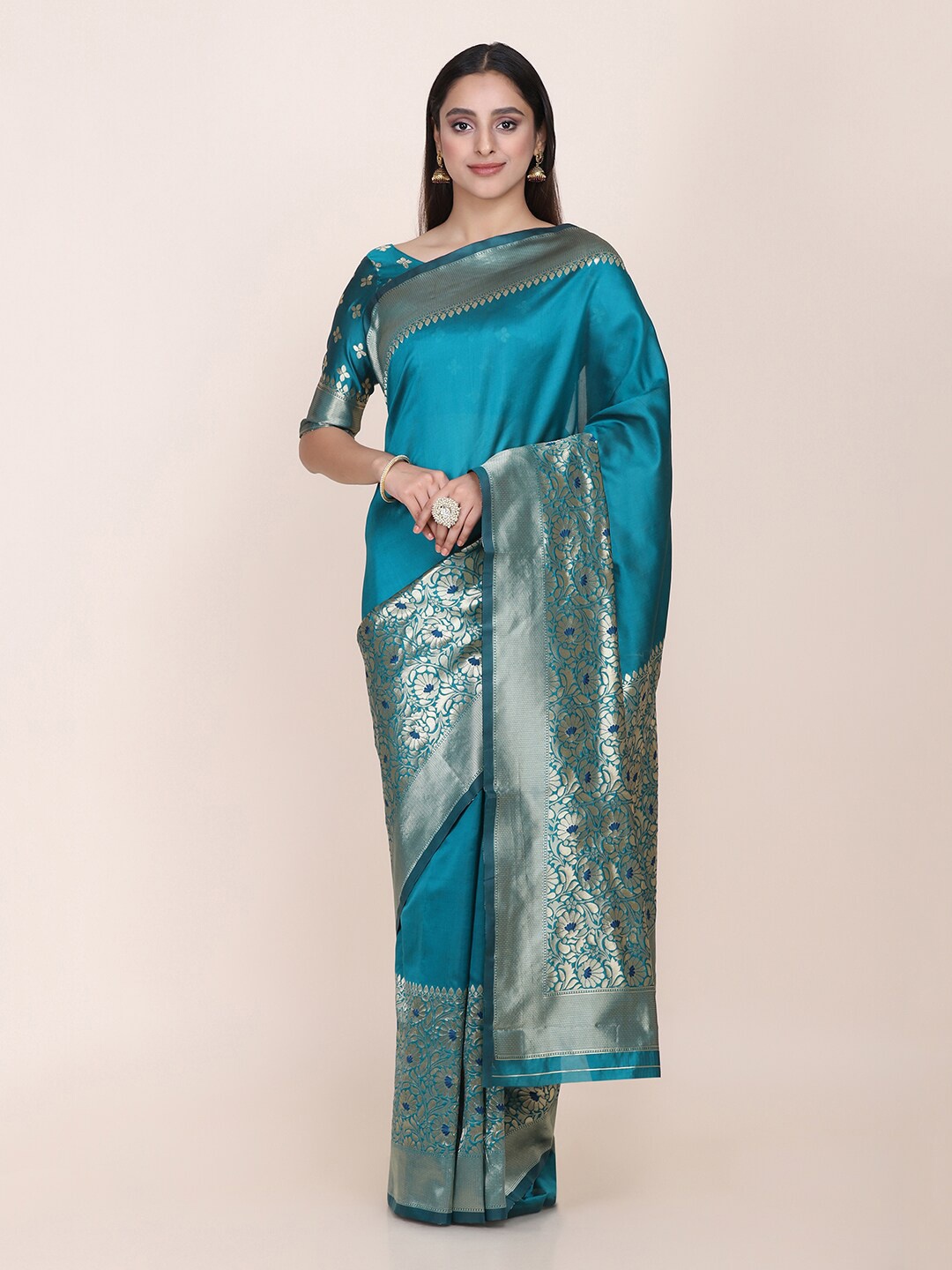 

Shaily Teal Blue & Golden Floral Zari Silk Blend Saree