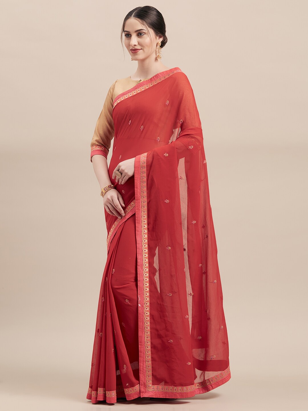 

Shaily Red & Golden Ethnic Motifs Saree