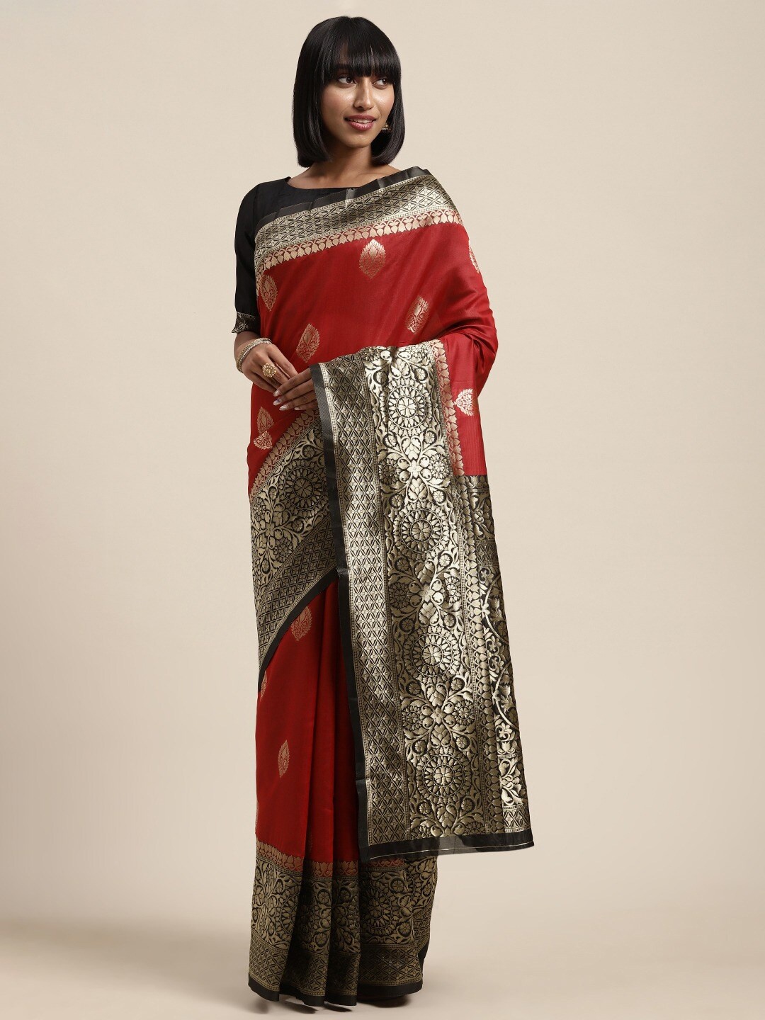 

Shaily Red & Golden Ethnic Motifs Zari Silk Blend Saree